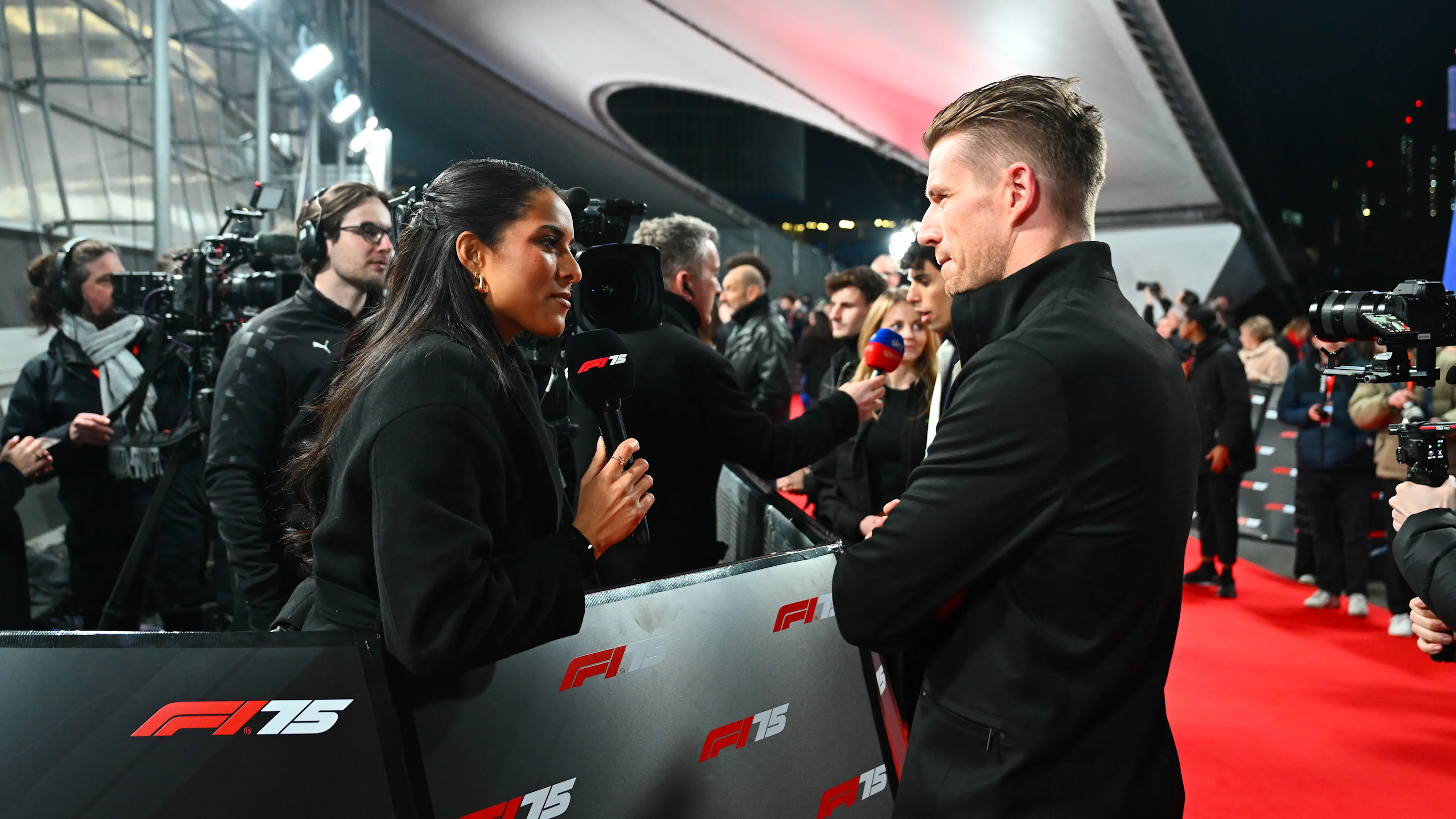 LONDON, ENGLAND - FEBRUARY 18: Nico Hulkenberg of Germany and Stake F1 Team Kick Sauber talks to