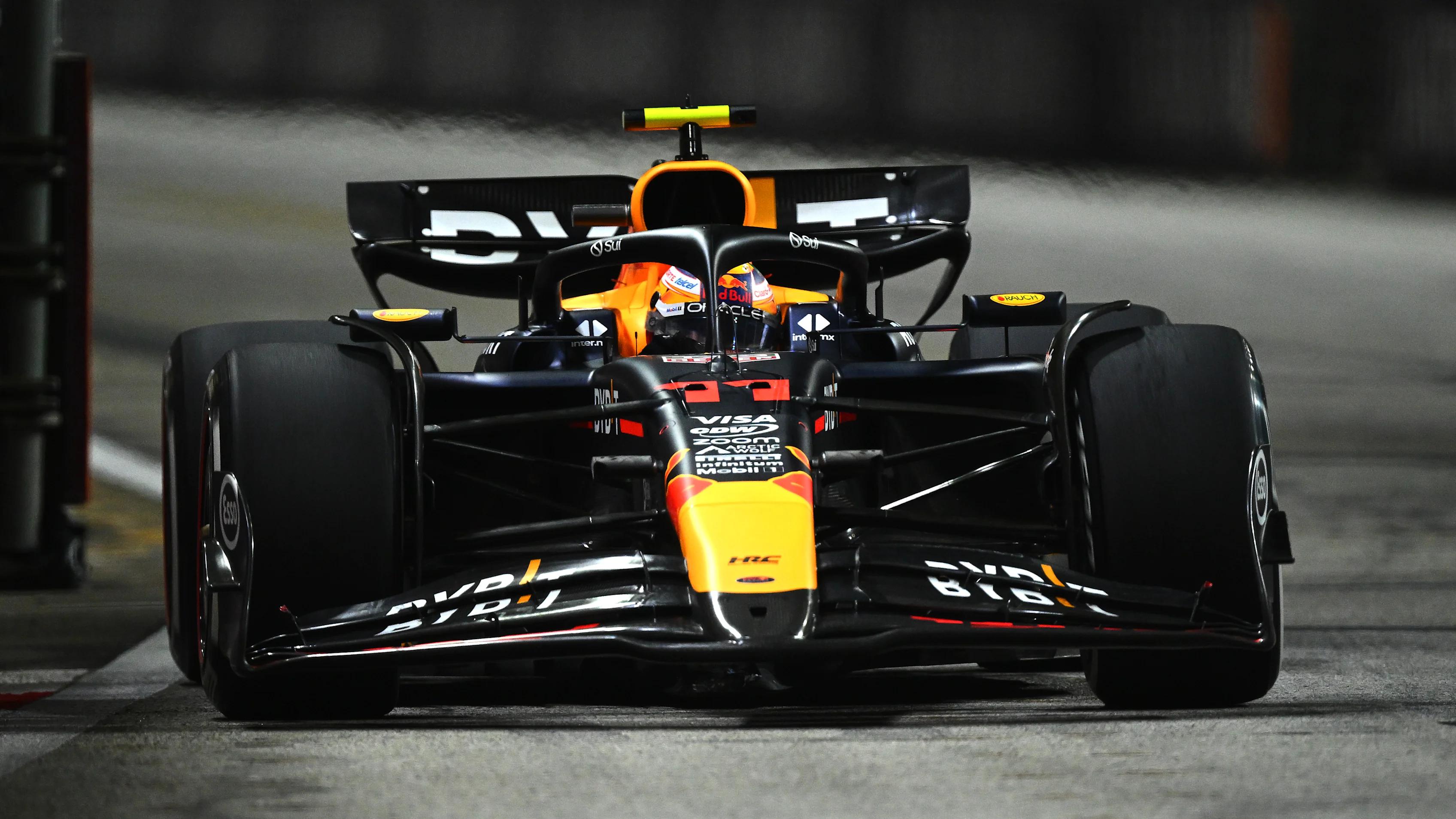 SINGAPORE, SINGAPORE - SEPTEMBER 20: Sergio Perez of Mexico driving the (11) Oracle Red Bull Racing