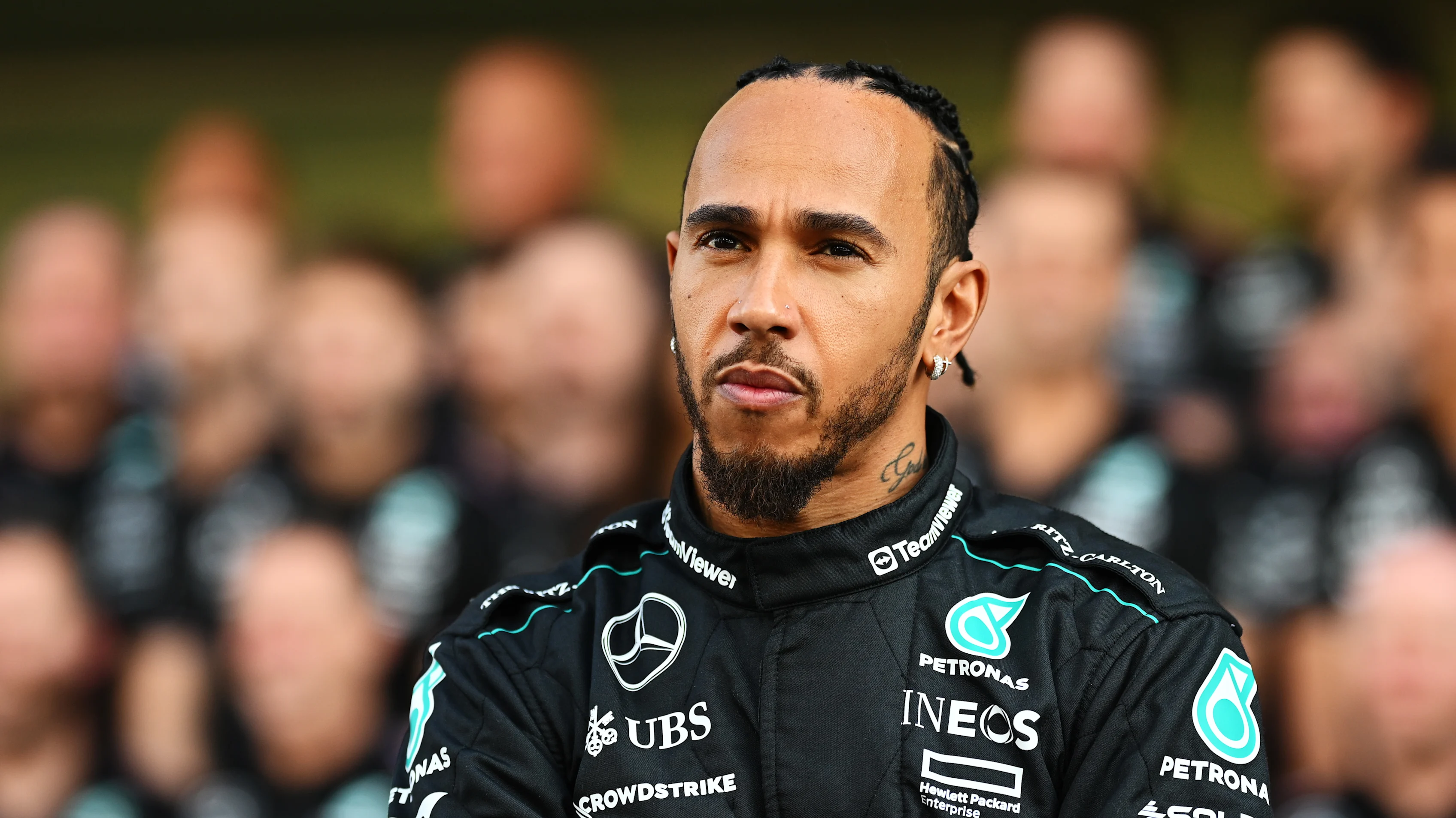 ABU DHABI, UNITED ARAB EMIRATES - DECEMBER 05: Lewis Hamilton of Great Britain and Mercedes looks