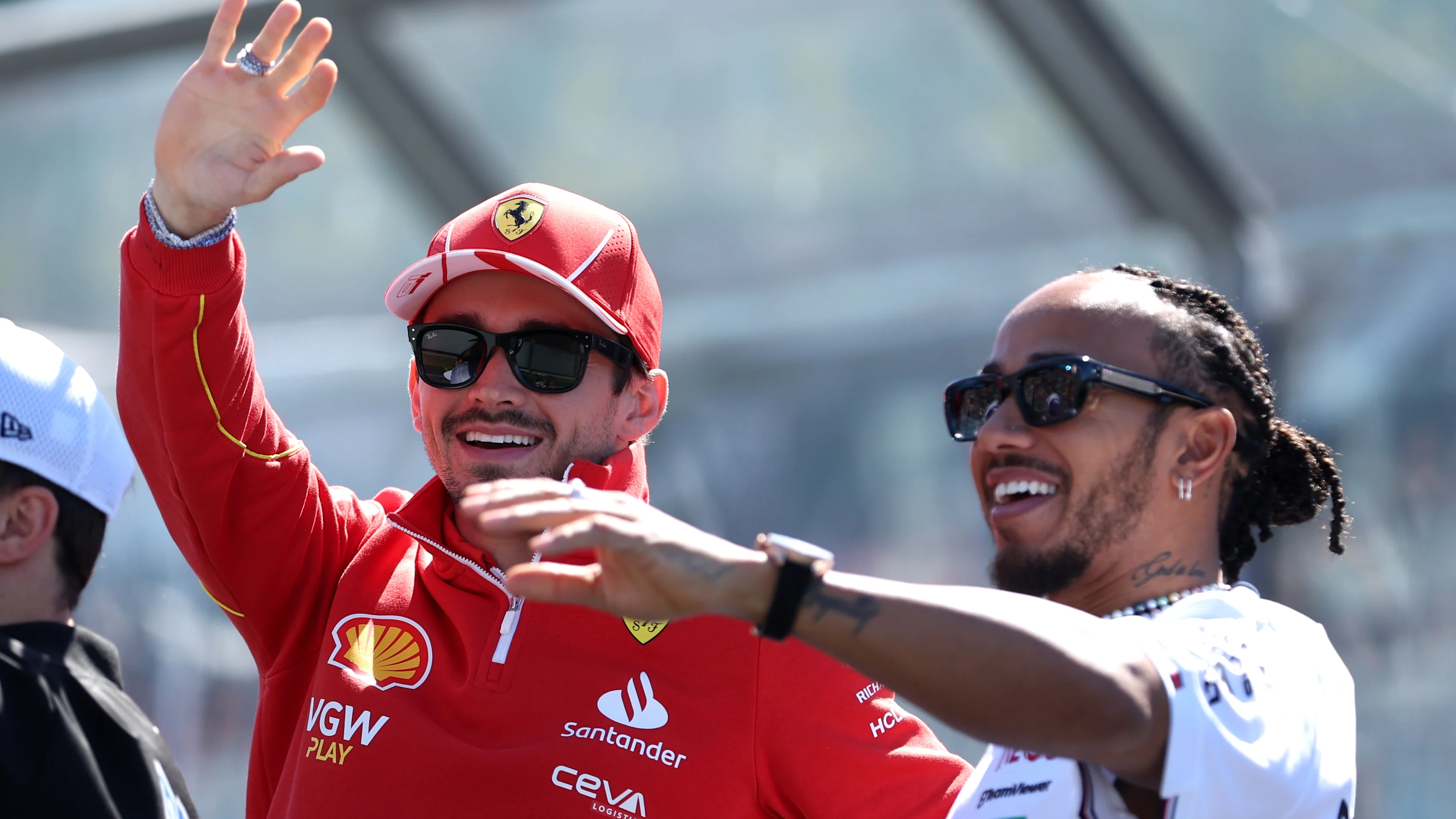 MELBOURNE, AUSTRALIA - MARCH 24: Charles Leclerc of Monaco and Ferrari and Lewis Hamilton of Great