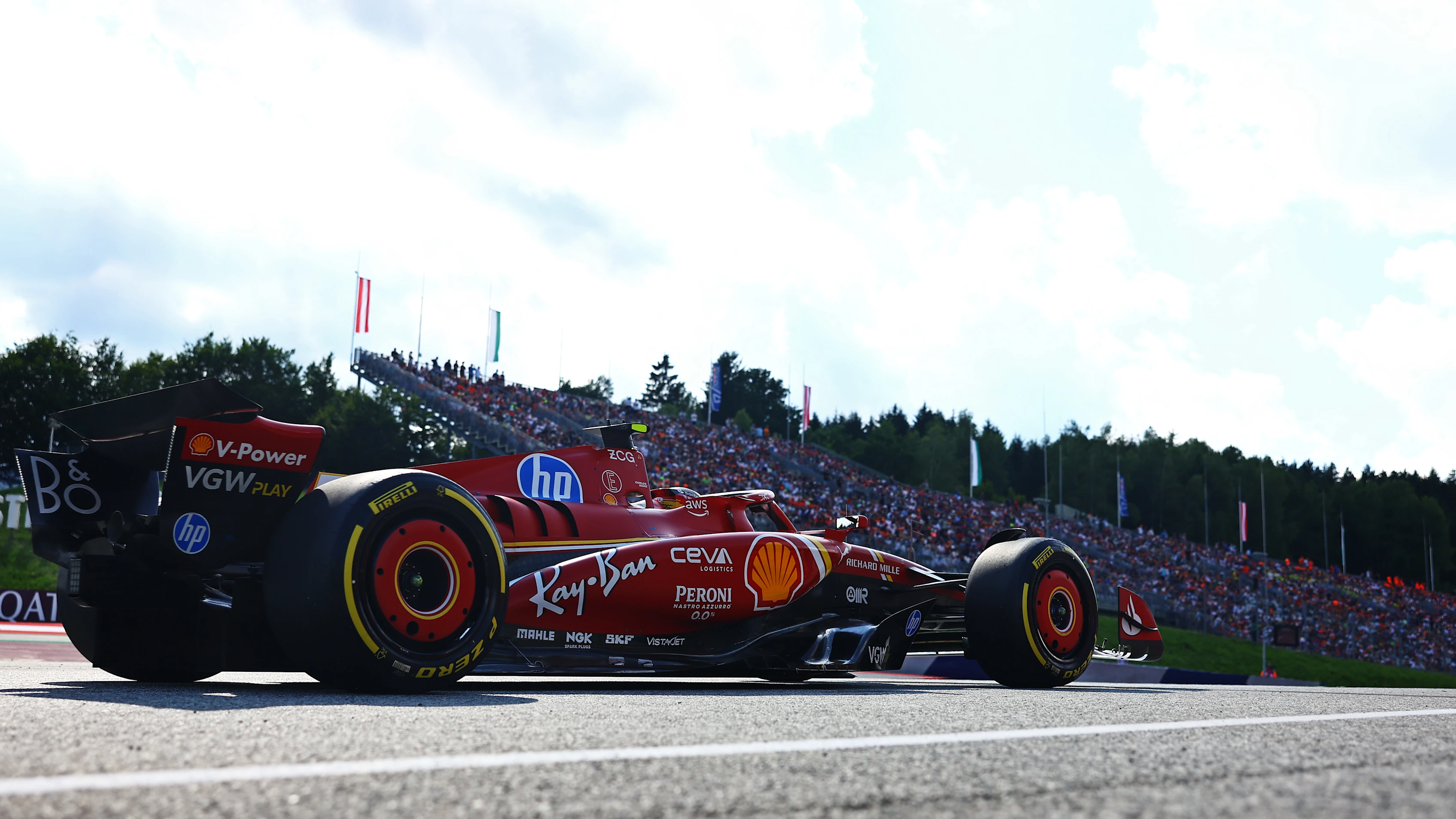 SPIELBERG, AUSTRIA - JUNE 28: Carlos Sainz of Spain driving (55) the Ferrari SF-24 leaves the pitlane during Sprint Qualifying ahead of the F1 Grand Prix of Austria at Red Bull Ring on June 28, 2024 in Spielberg, Austria. (Photo by Mark Thompson/Getty Images)