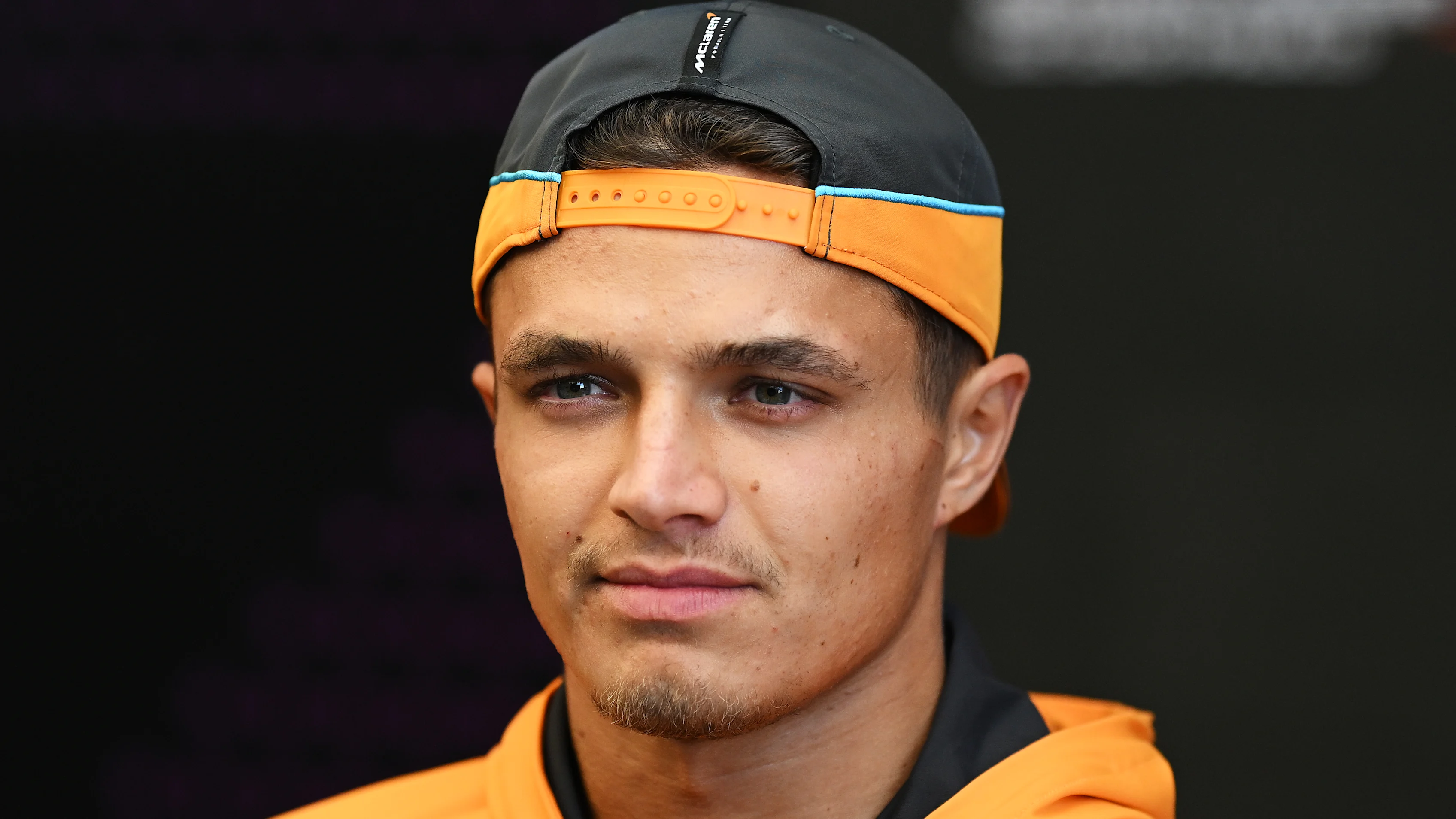 SAO PAULO, BRAZIL - OCTOBER 31: Lando Norris of Great Britain and McLaren looks on in the Paddock