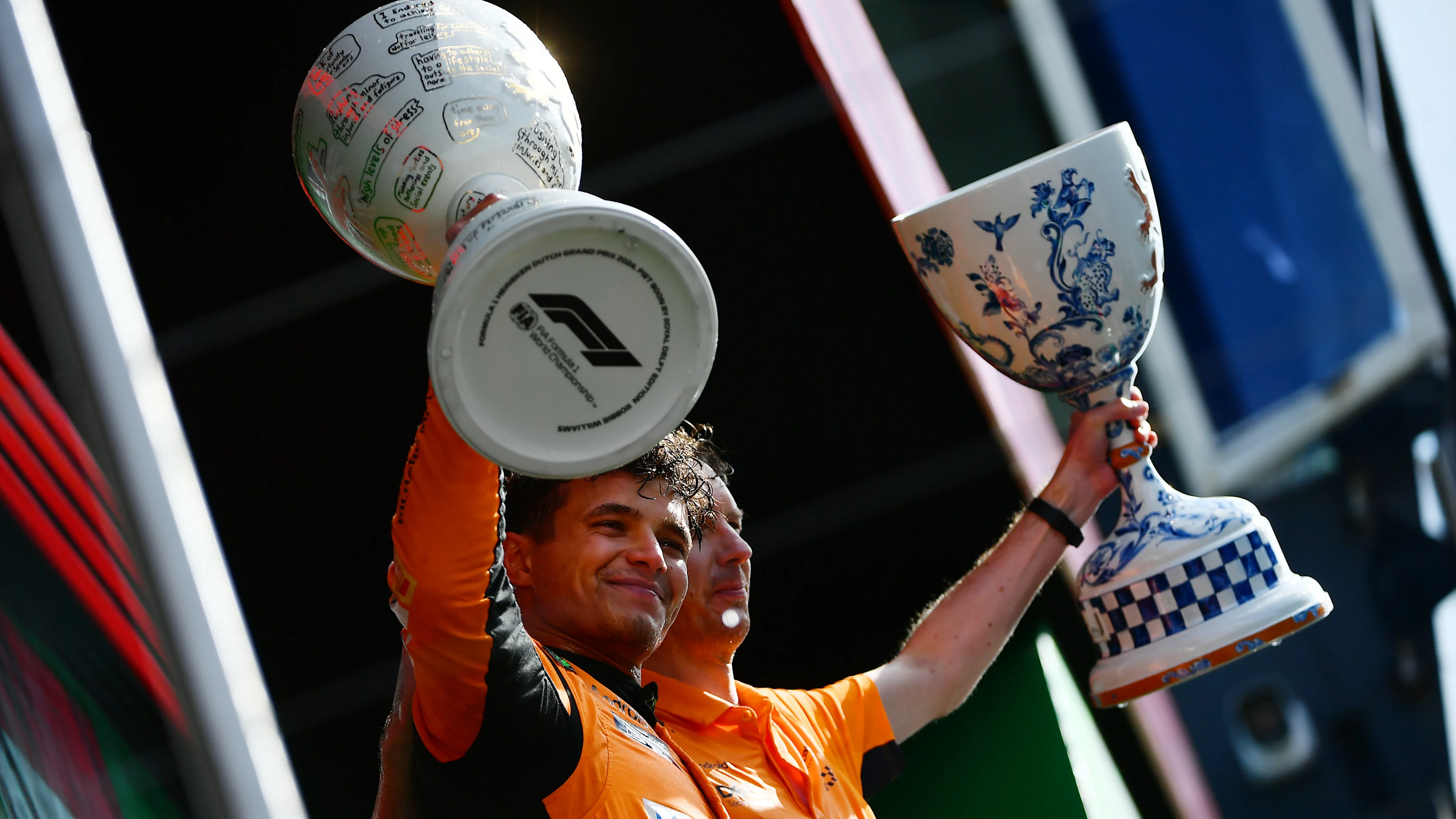 ZANDVOORT, NETHERLANDS - AUGUST 25: Race winner Lando Norris of Great Britain and McLaren
