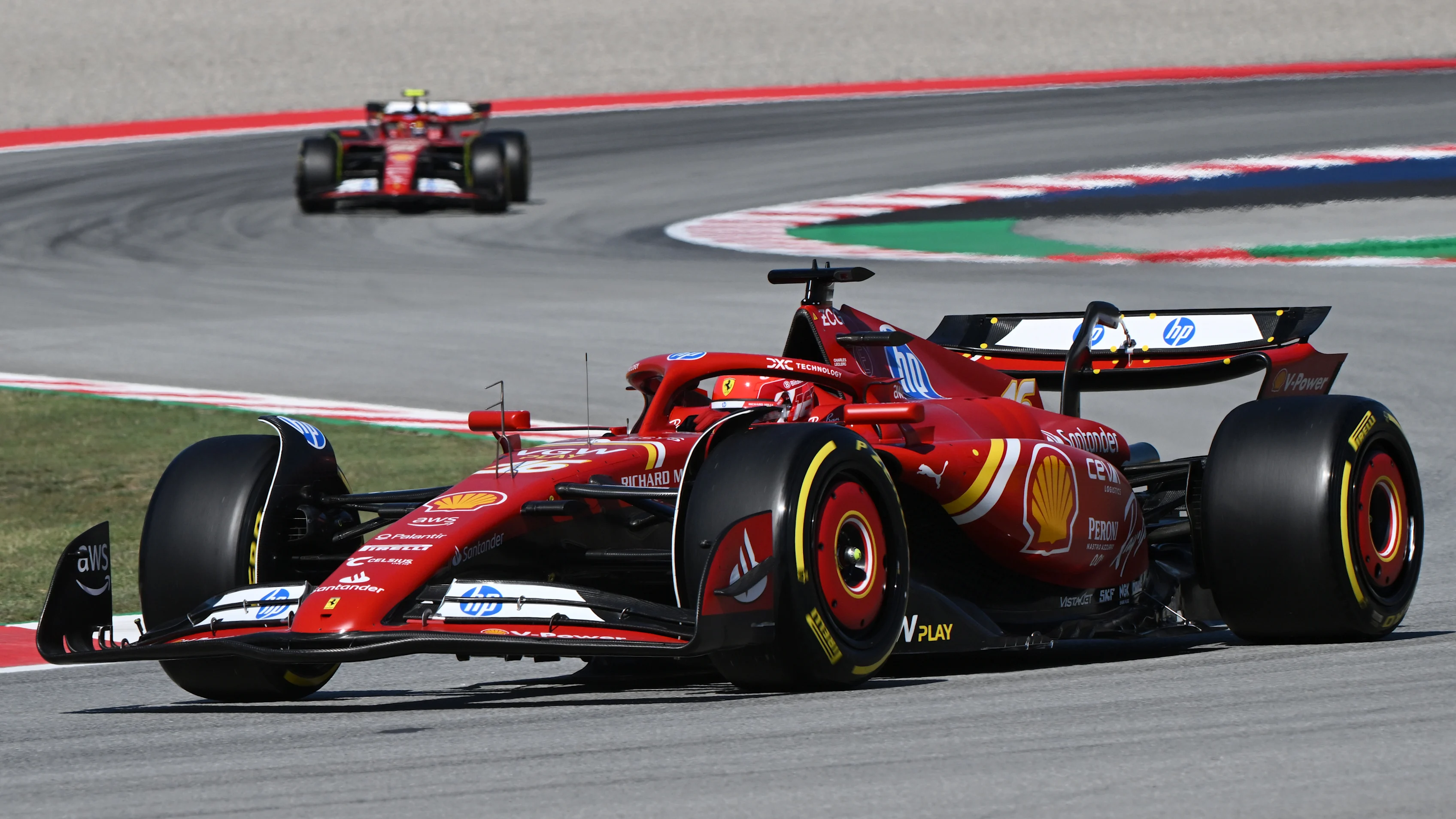 BARCELONA, SPAIN - JUNE 21: Charles Leclerc of Monaco driving the (16) Ferrari SF-24 leads Carlos