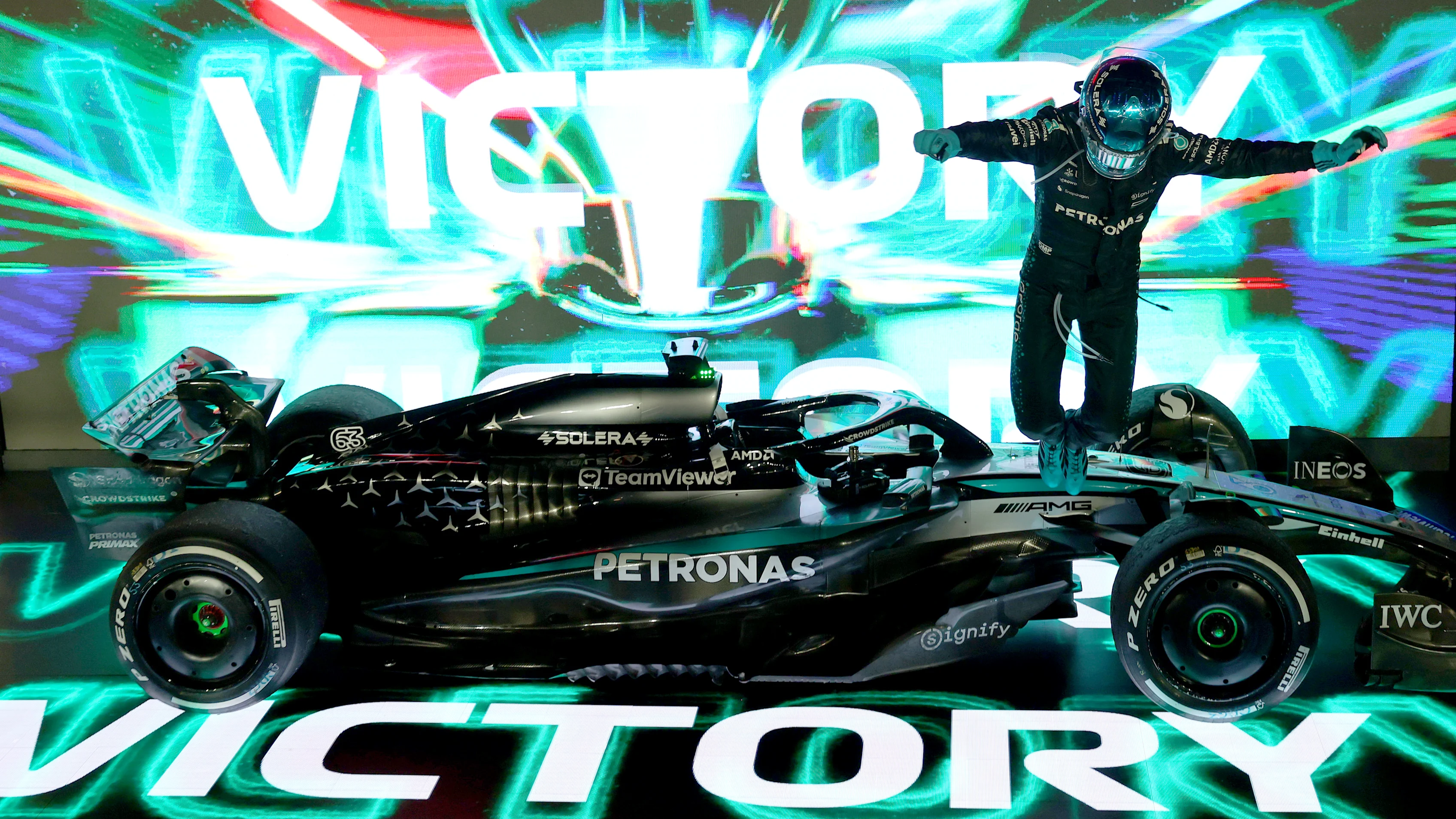 SINGAPORE, SINGAPORE - OCTOBER 05: Race winner George Russell of Great Britain and Mercedes AMG