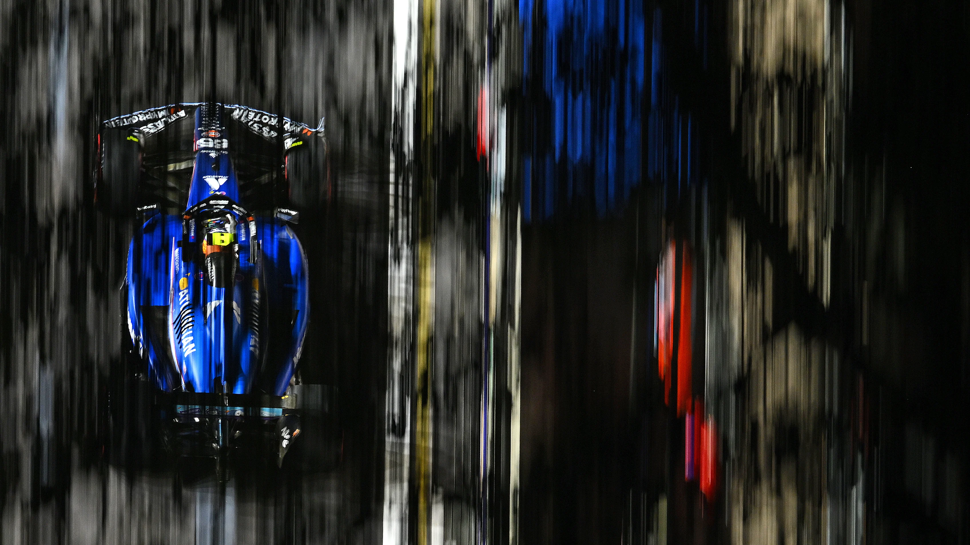 SINGAPORE, SINGAPORE - OCTOBER 03: Carlos Sainz of Spain driving the (55) Williams FW47 Mercedes on