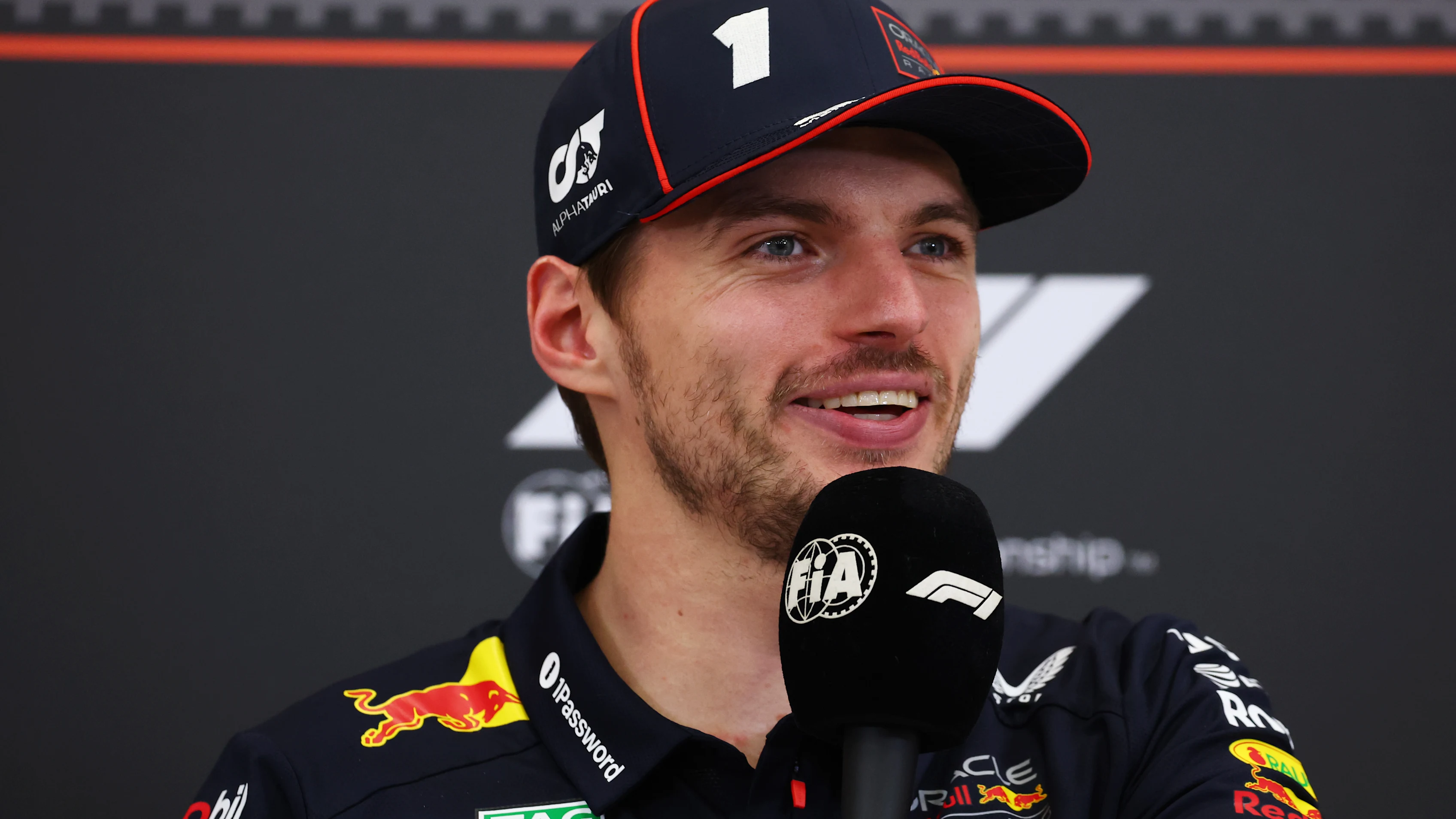 ABU DHABI, UNITED ARAB EMIRATES - DECEMBER 07: Race winner Max Verstappen of the Netherlands and