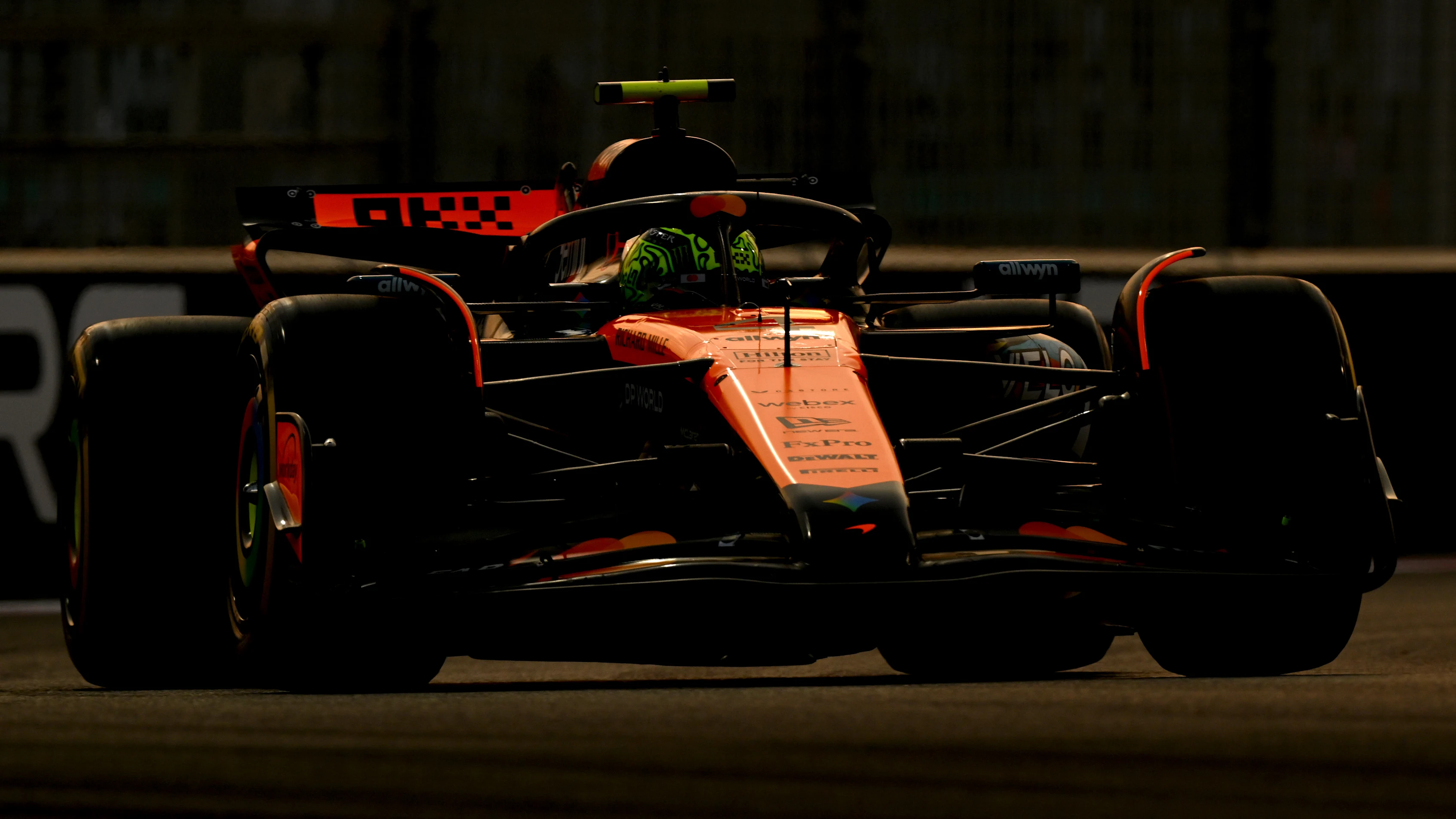ABU DHABI, UNITED ARAB EMIRATES - DECEMBER 05: Lando Norris of Great Britain driving the (4)