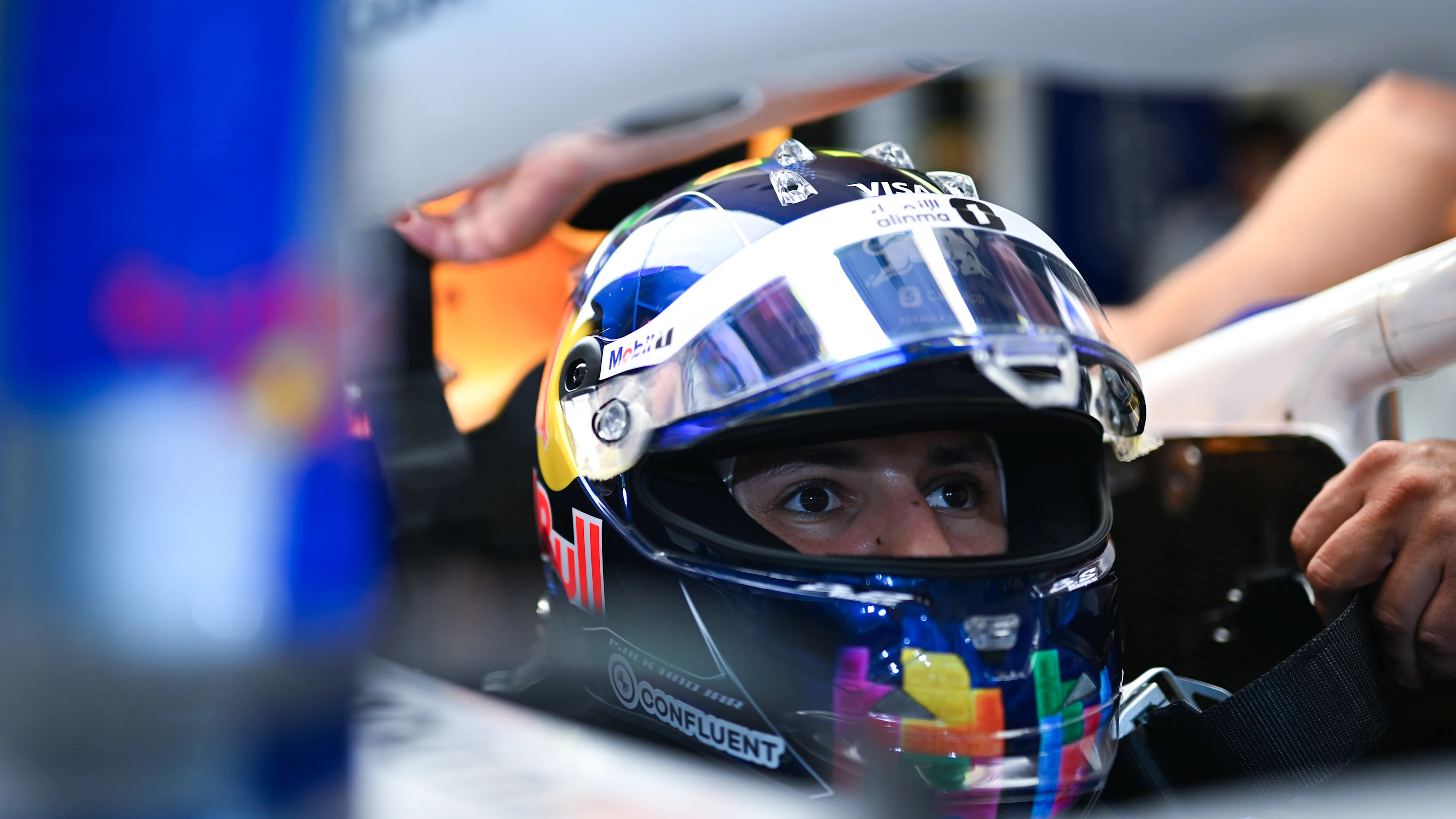 ABU DHABI, UNITED ARAB EMIRATES - DECEMBER 06: Isack Hadjar of France and Visa Cash App Racing Bulls prepares to drive in the garage during qualifying ahead of the F1 Grand Prix of Abu Dhabi at Yas Marina Circuit on December 06, 2025 in Abu Dhabi, United Arab Emirates. (Photo by Rudy Carezzevoli/Getty Images)