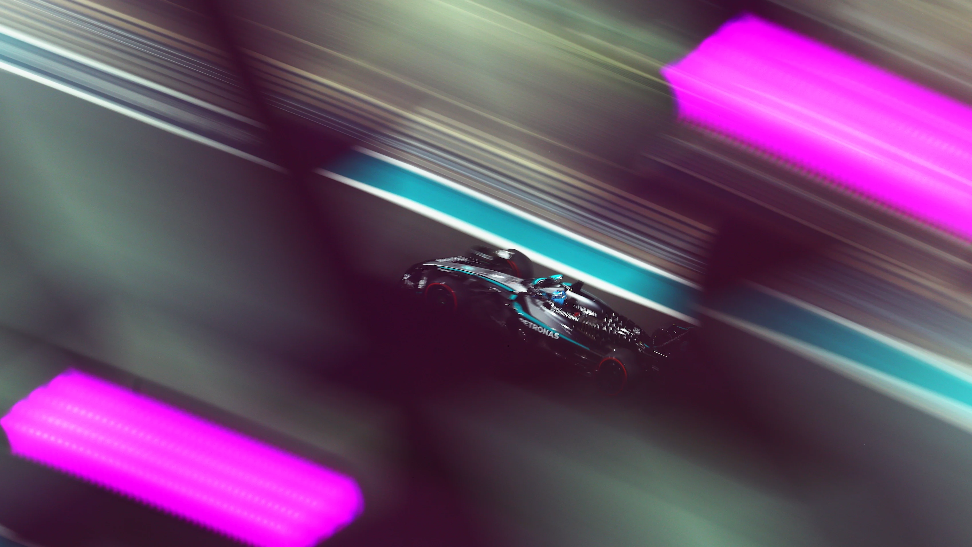 ABU DHABI, UNITED ARAB EMIRATES - DECEMBER 06: George Russell of Great Britain driving the (63)