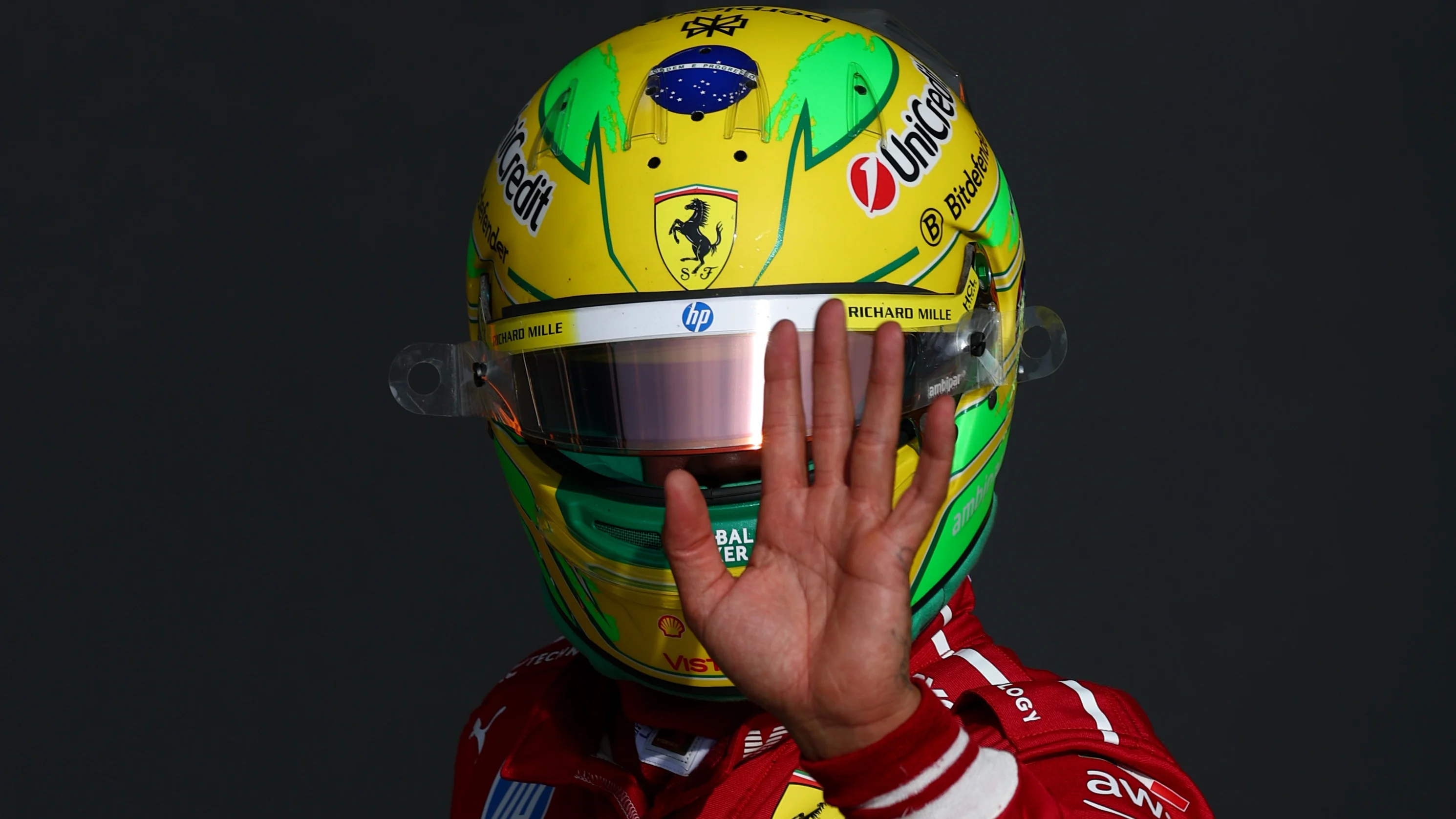 SAO PAULO, BRAZIL - NOVEMBER 07: Lewis Hamilton of Great Britain and Scuderia Ferrari waves in parc