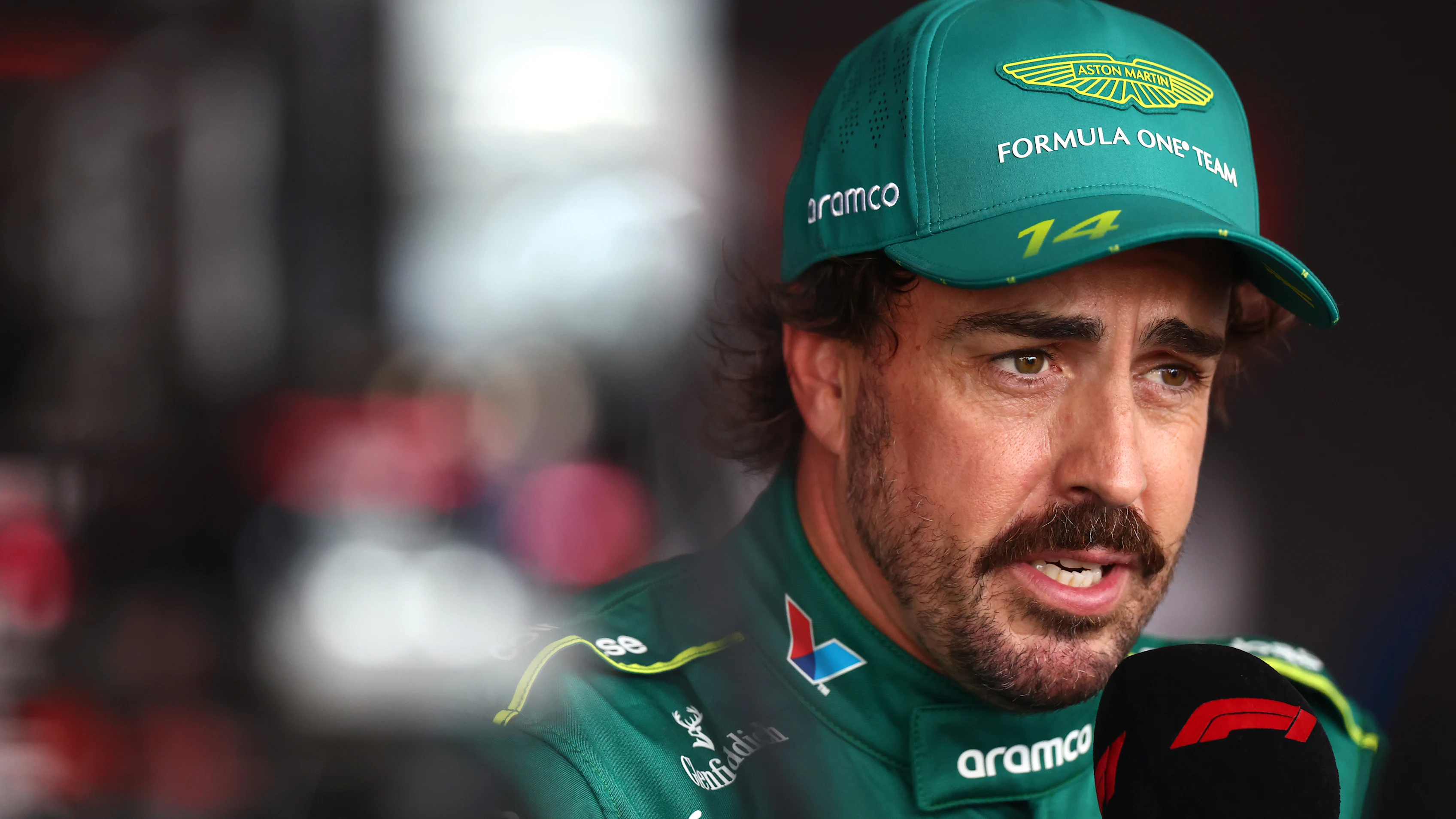 BUDAPEST, HUNGARY - AUGUST 01: Fernando Alonso of Spain and Aston Martin F1 Team is interviewed
