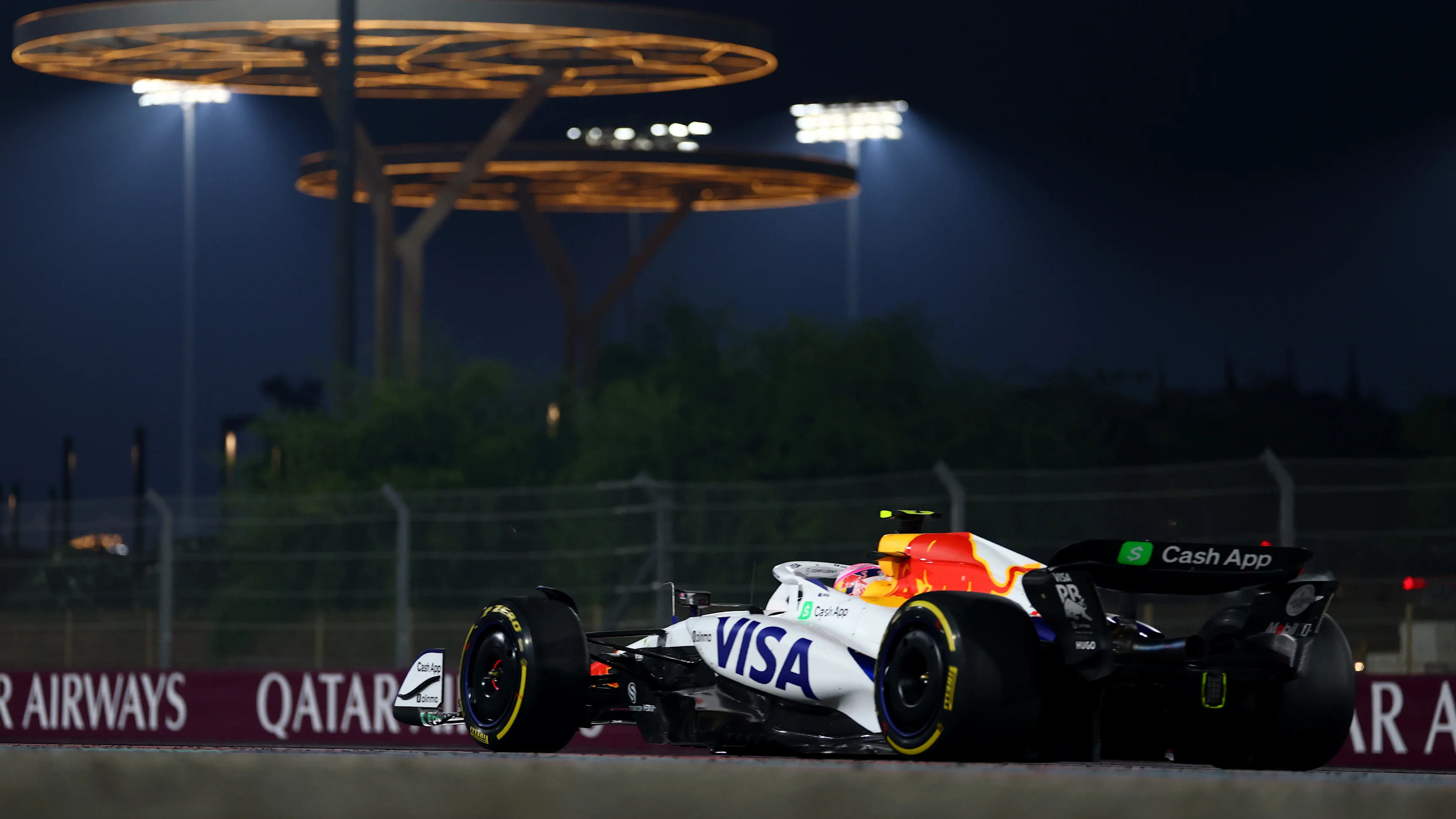 LUSAIL CITY, QATAR - NOVEMBER 30: Liam Lawson of New Zealand driving the (30) Visa Cash App Racing