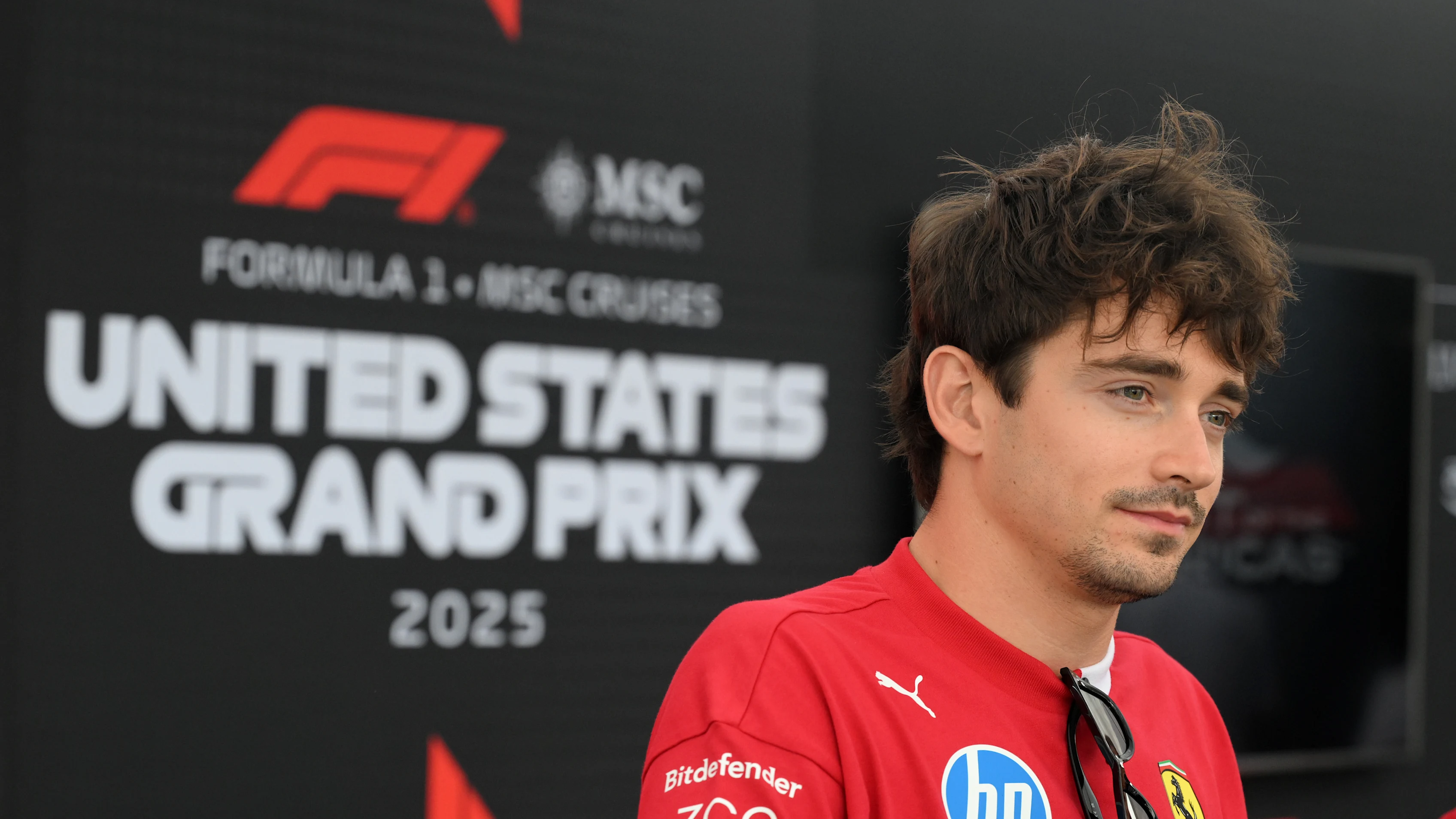 AUSTIN, TEXAS - OCTOBER 16: Charles Leclerc of Monaco and Scuderia Ferrari talks to the media