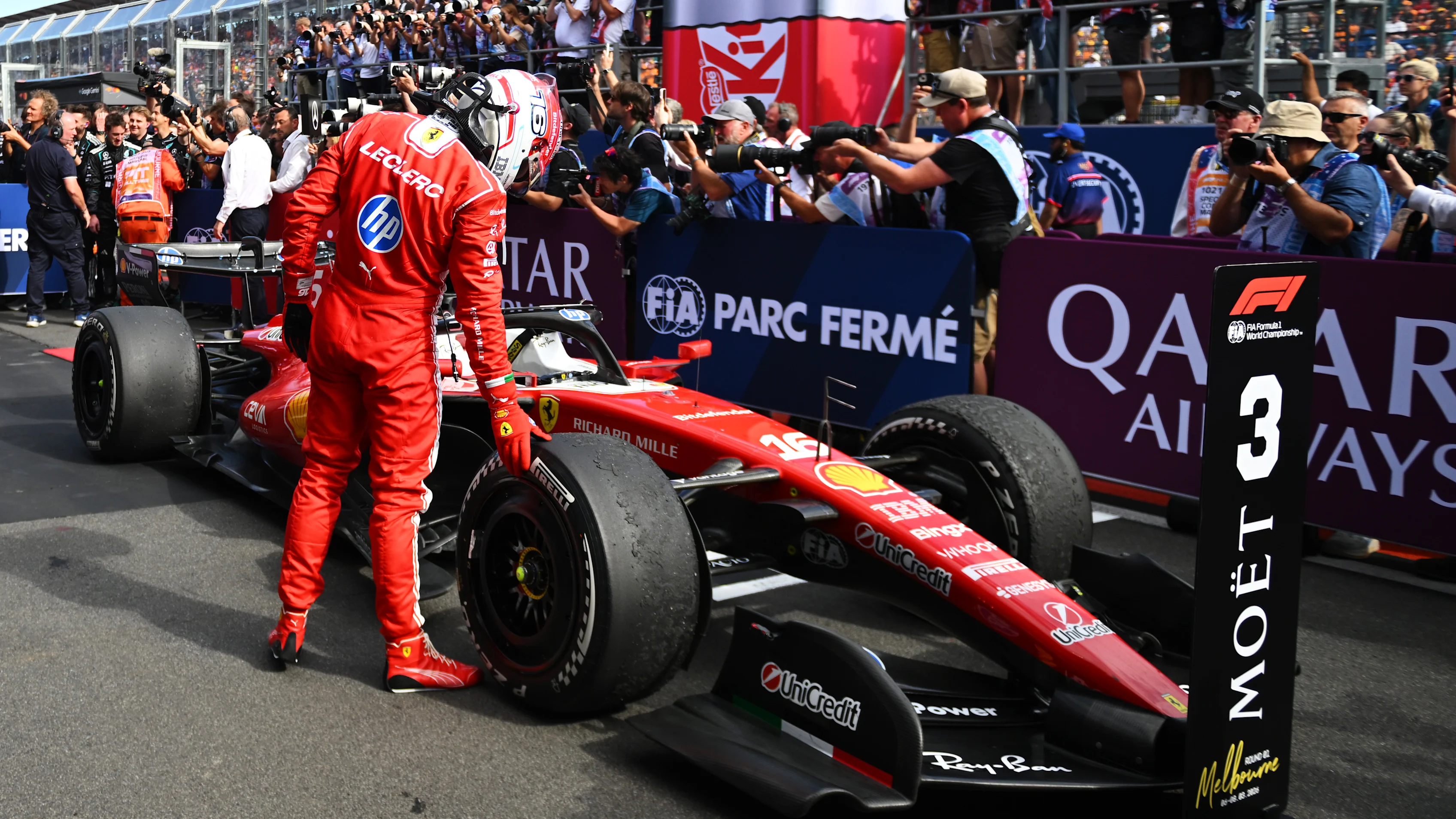 MELBOURNE, AUSTRALIA - MARCH 08: Third placed Charles Leclerc of Monaco and Scuderia Ferrari inspects his car in parc ferme during the F1 Grand Prix of Australia at Albert Park Grand Prix Circuit on March 08, 2026 in Melbourne, Australia. (Photo by Rudy Carezzevoli/Getty Images)