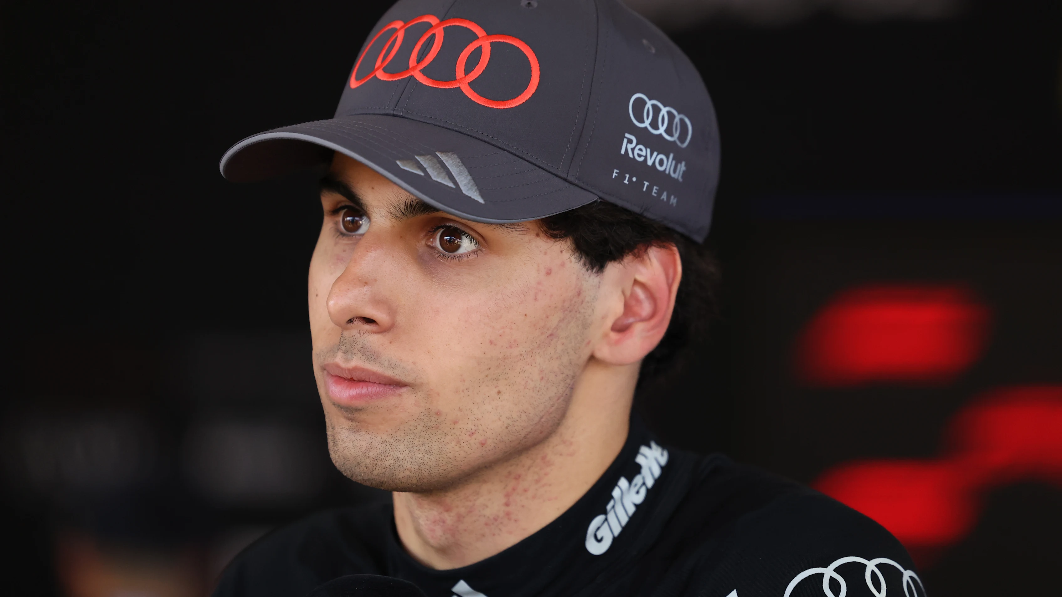 MELBOURNE, AUSTRALIA - MARCH 06: Gabriel Bortoleto of Brazil and Audi F1 Team is interviewed during