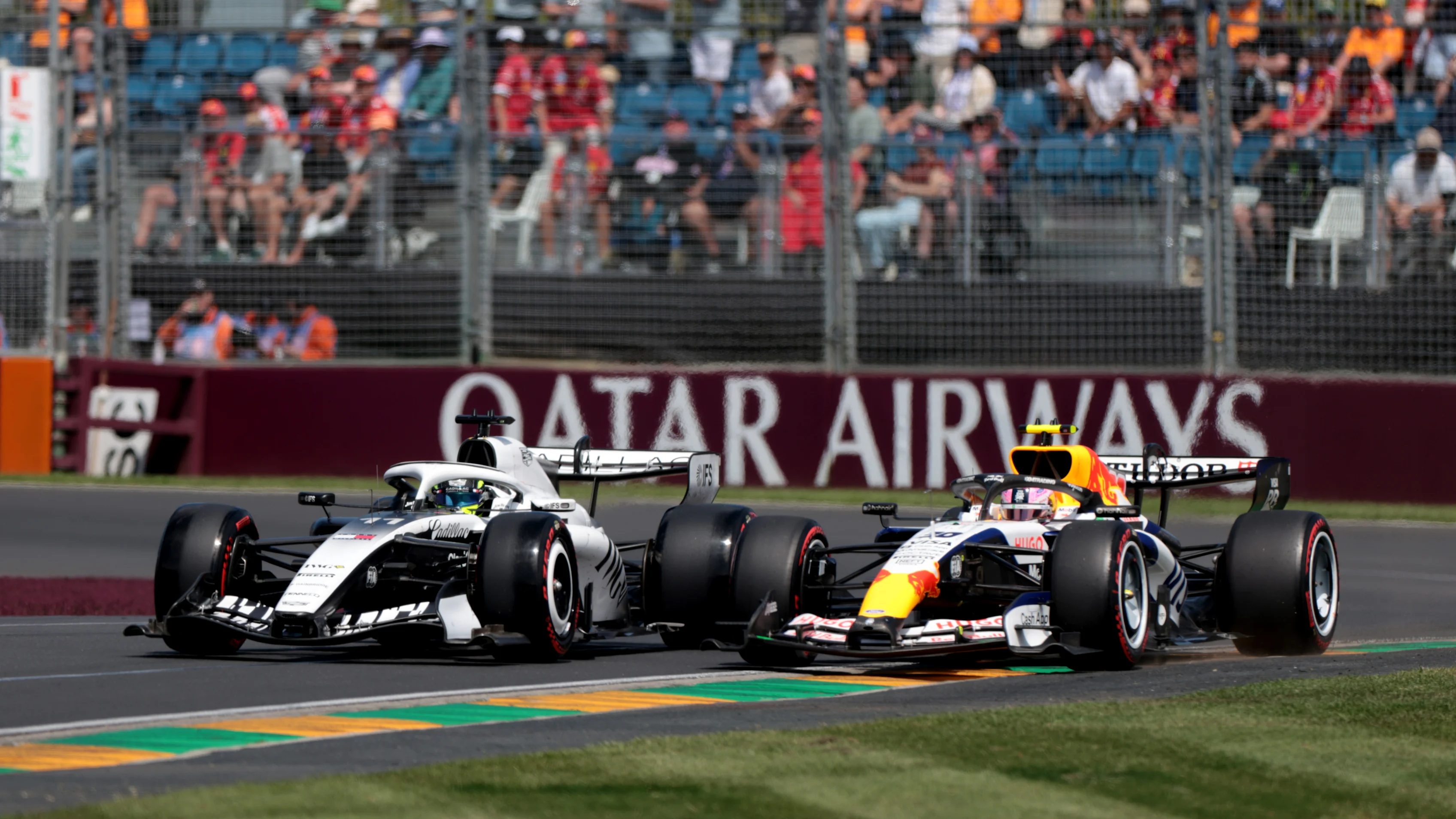 MELBOURNE, AUSTRALIA - MARCH 07: Sergio Perez of Mexico driving the (11) Cadillac F1 Team MAC-26 Ferrari leads Liam Lawson of New Zealand driving the (30) Visa Cash App Racing Bulls VCARB 03 RB Ford on track during final practice ahead of the F1 Grand Prix of Australia at Albert Park Grand Prix Circuit on March 07, 2026 in Melbourne, Australia. (Photo by Anni Graf - Formula 1/Formula 1 via Getty Images)