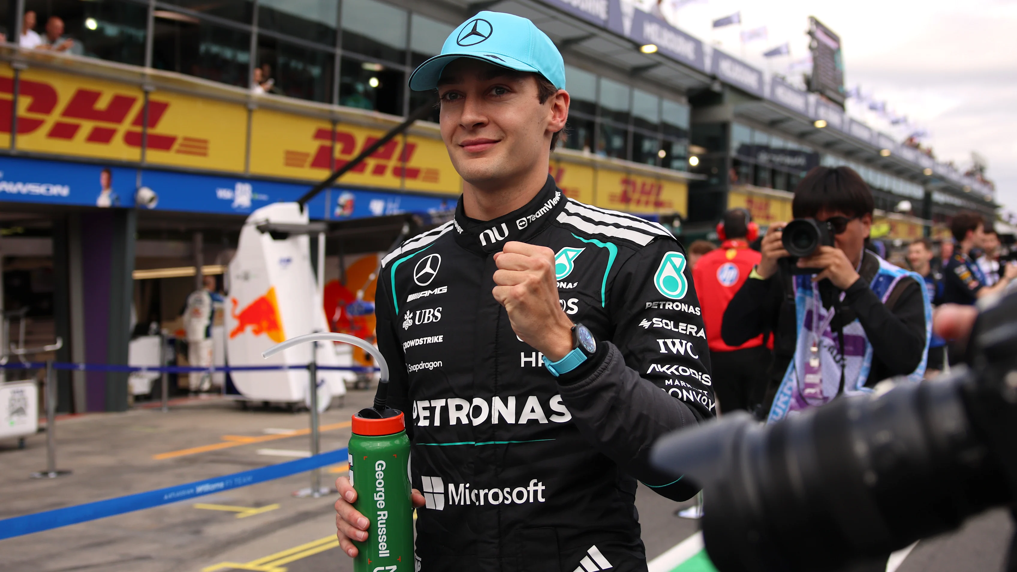 MELBOURNE, AUSTRALIA - MARCH 07: Pole position qualifier George Russell of Great Britain and Mercedes AMG Petronas F1 Team celebrates in parc ferme during qualifying ahead of the F1 Grand Prix of Australia at Albert Park Grand Prix Circuit on March 07, 2026 in Melbourne, Australia. (Photo by Anni Graf - Formula 1/Formula 1 via Getty Images)