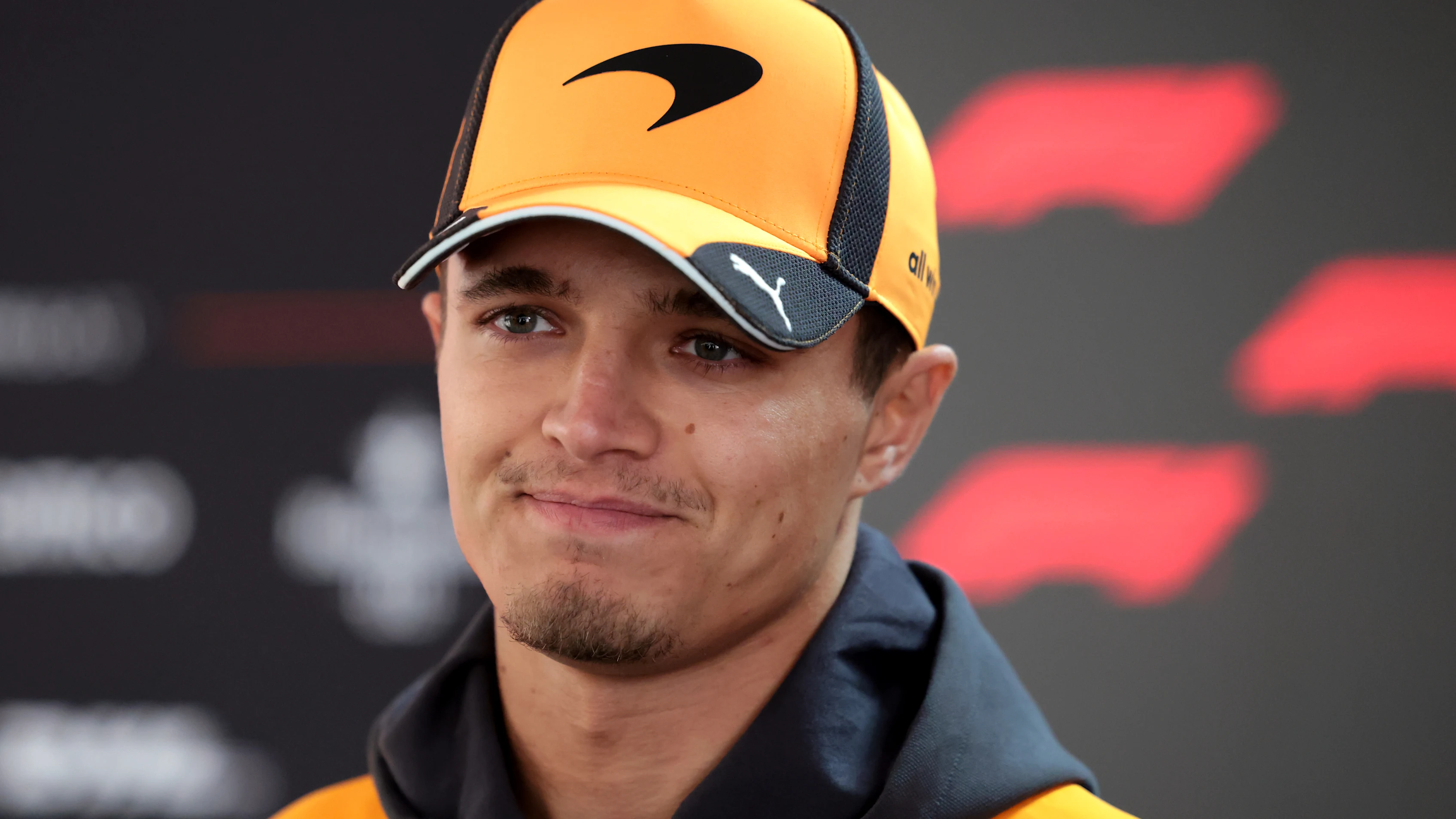 SHANGHAI, CHINA - MARCH 12: Lando Norris of Great Britain and McLaren talks to the media during