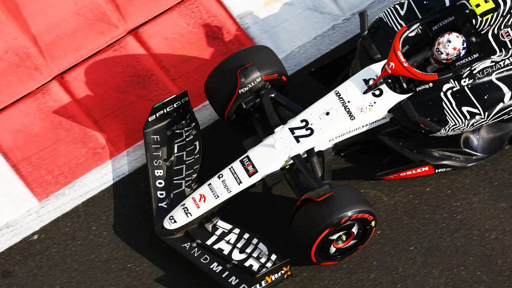 ABU DHABI, UNITED ARAB EMIRATES - NOVEMBER 25: Yuki Tsunoda of Japan driving the (22) Scuderia