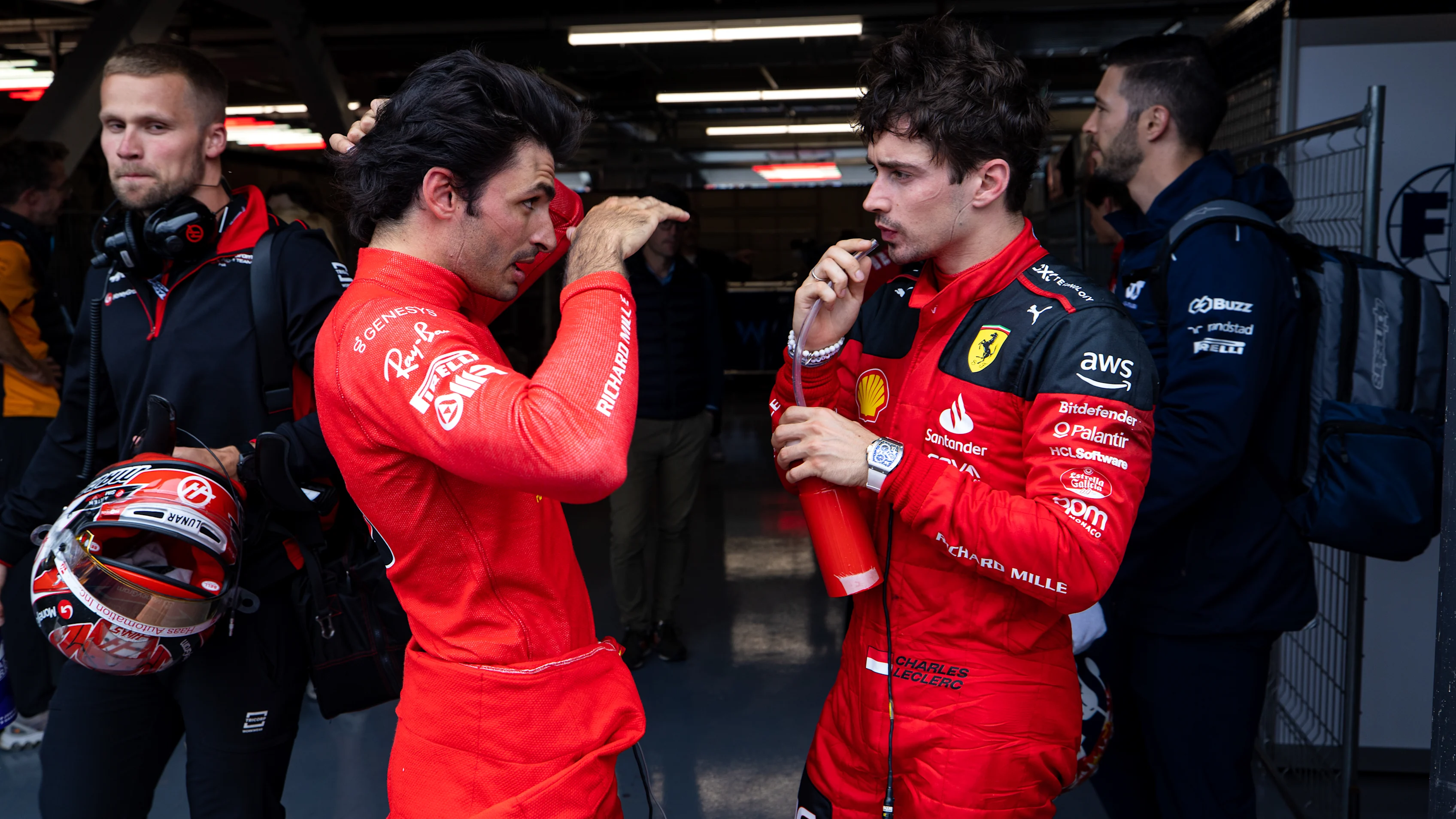 MONTREAL, QC - JUNE 18: Ferrari F1 drivers Carlos Sainz and Charles Leclerc chat post-race during