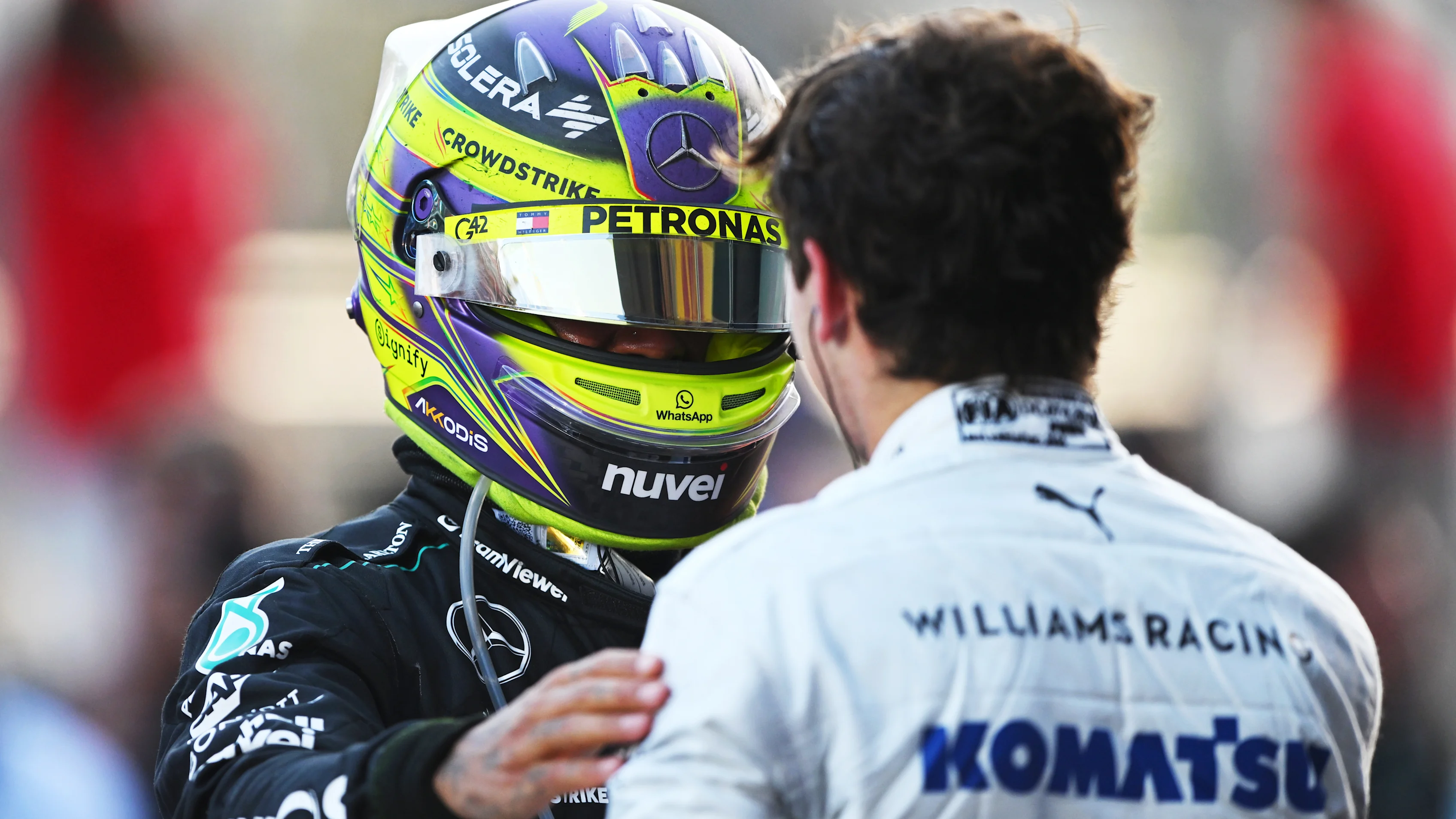 BAKU, AZERBAIJAN - SEPTEMBER 15: 9th placed Lewis Hamilton of Great Britain and Mercedes talks with