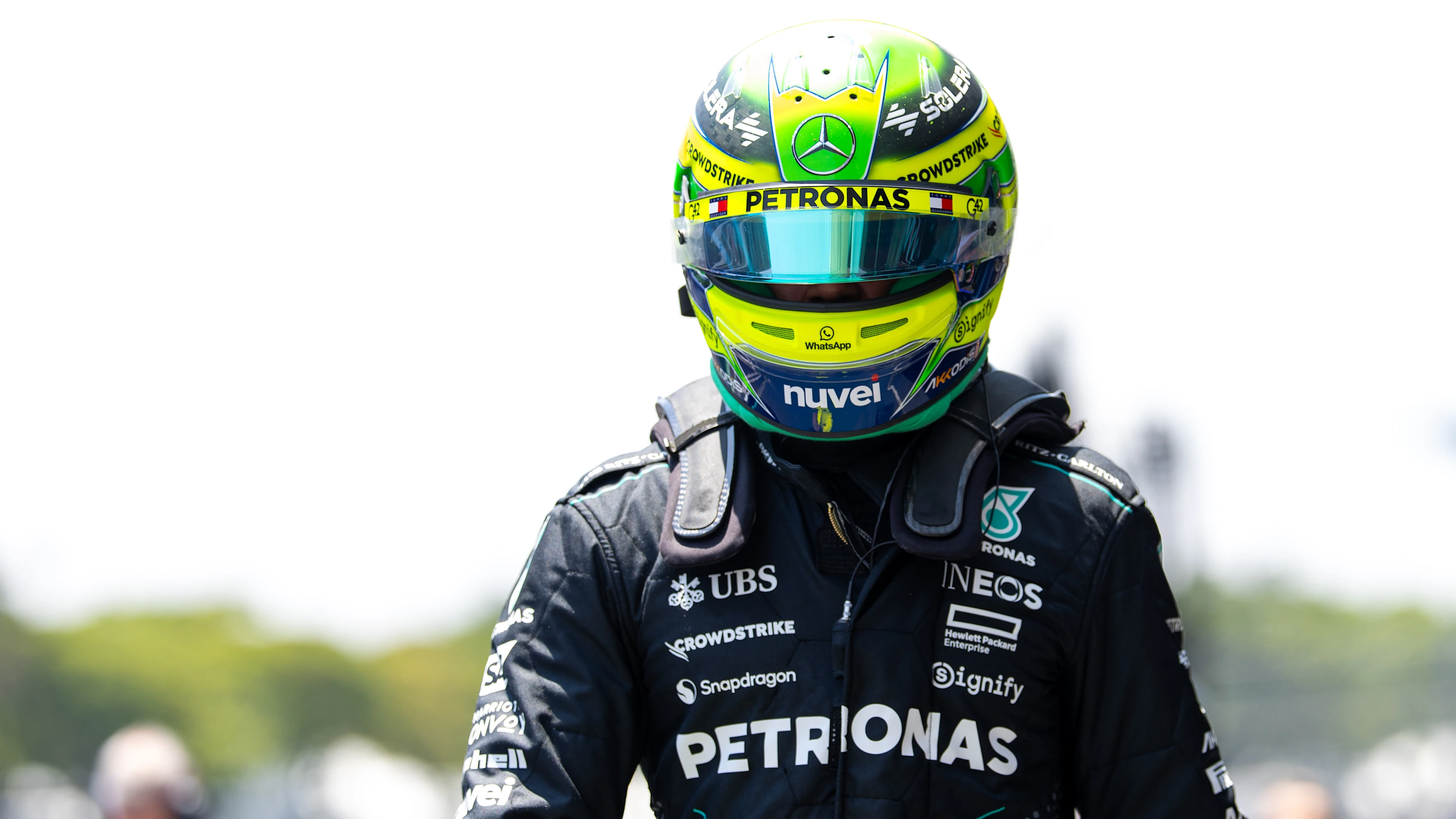 SAO PAULO, BRAZIL - OCTOBER 31: Lewis Hamilton of Great Britain and Mercedes walks in the Paddock