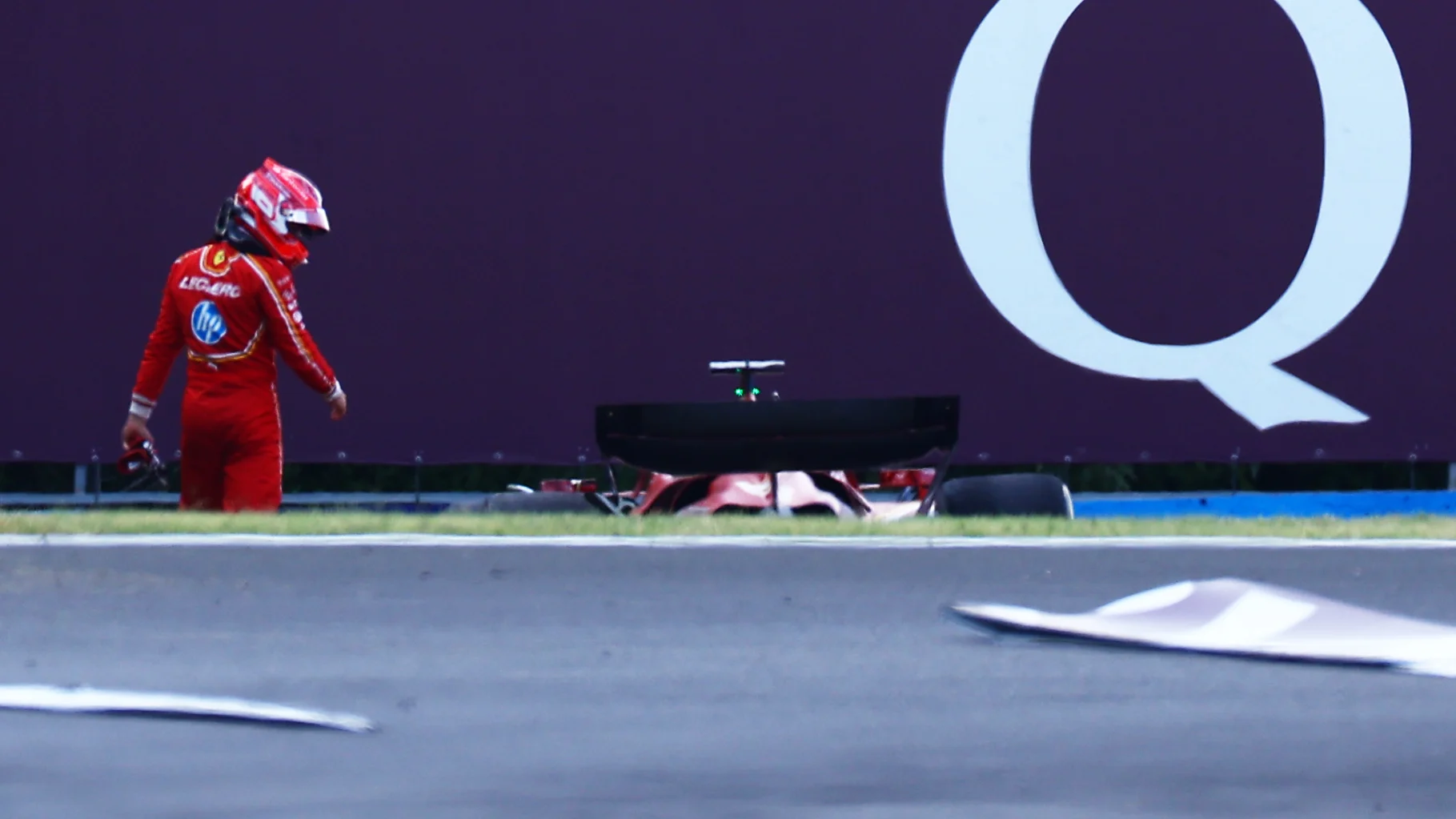 BUDAPEST, HUNGARY - JULY 19: Charles Leclerc of Monaco and Ferrari walks from his car after
