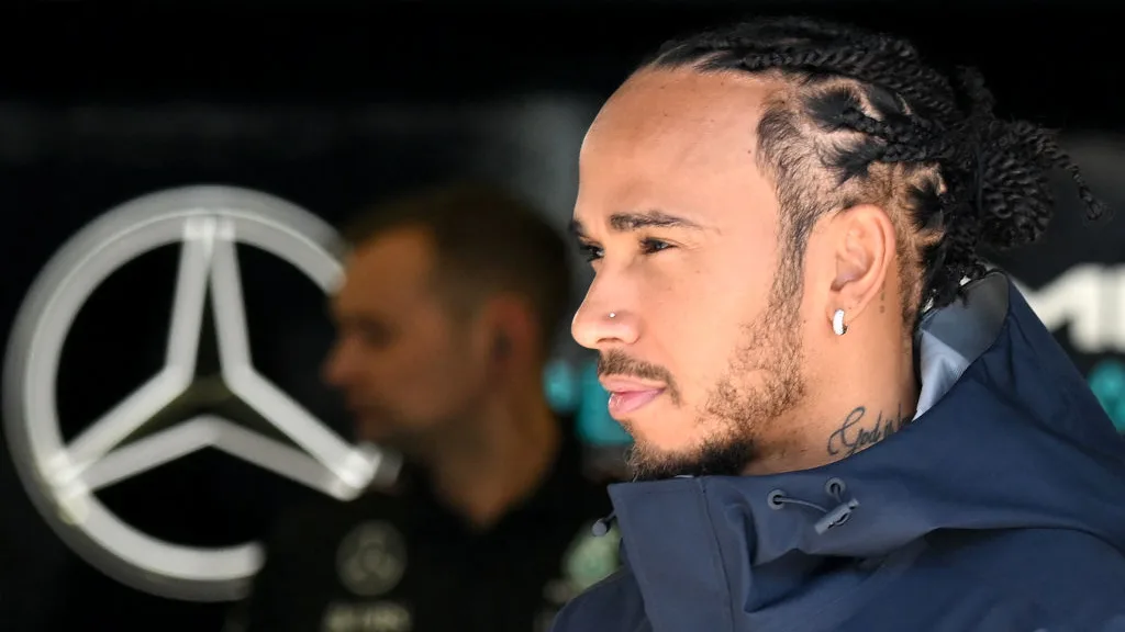 BAHRAIN, BAHRAIN - MARCH 01: Lewis Hamilton of Great Britain and Mercedes walks in the Paddock