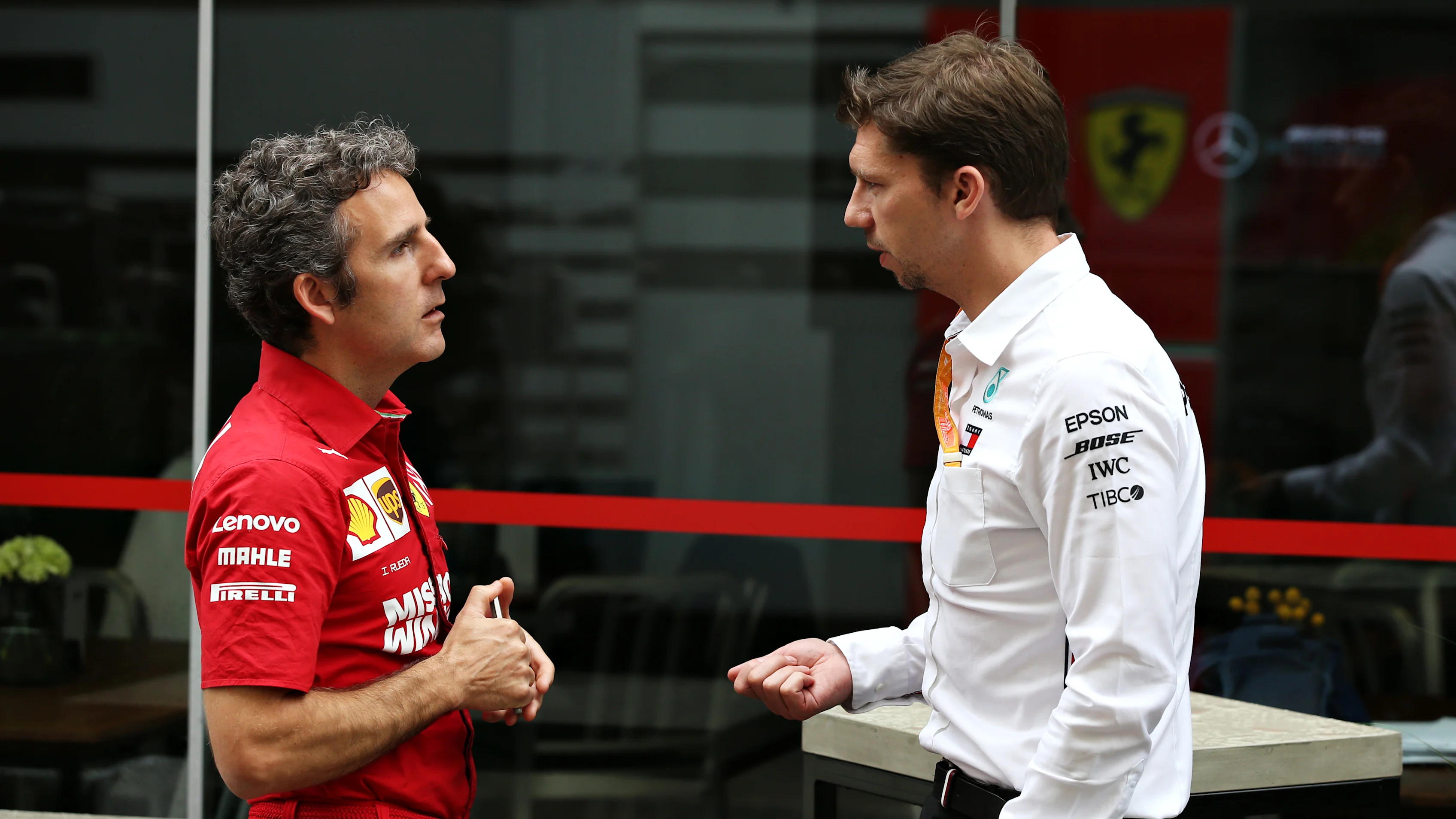 SAO PAULO, BRAZIL - NOVEMBER 14: Ferrari Chief Strategist Inaki Rueda talks with Mercedes GP Chief