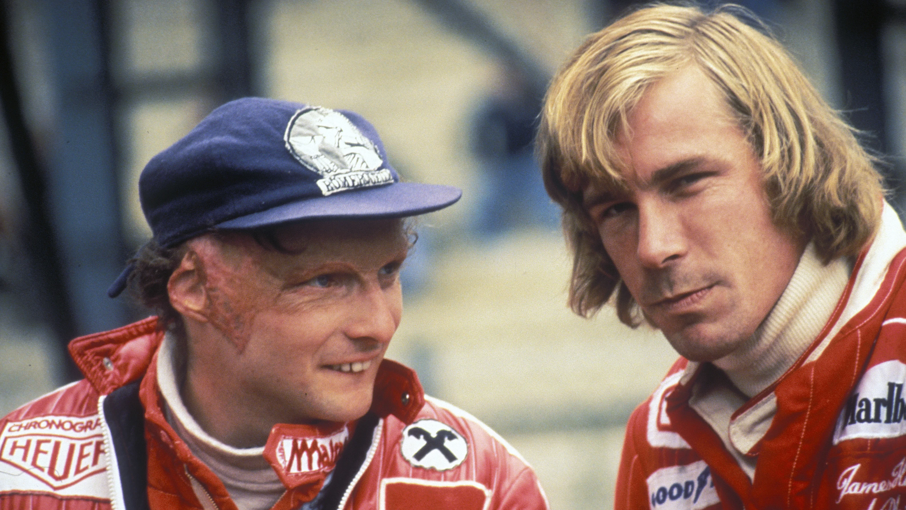 Niki Lauda of Austria, driver of the #11Scuderia Ferrari SpA Ferrari 312T2 Ferrari flat-12 talks to