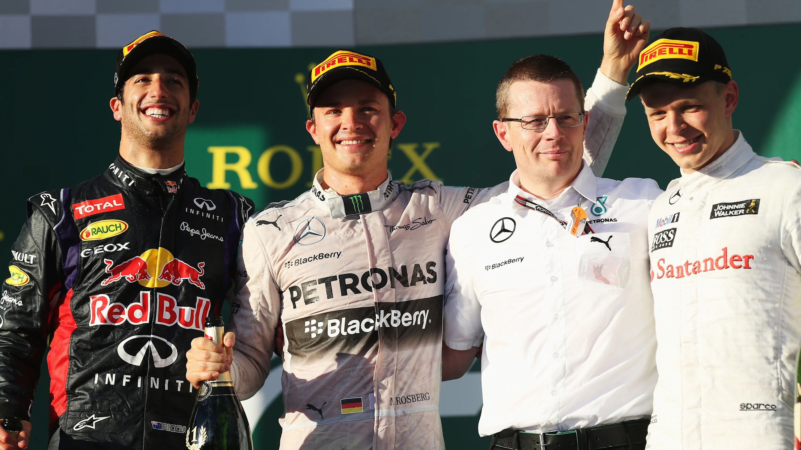 MELBOURNE, AUSTRALIA - MARCH 16:  Race winner Nico Rosberg (2nd left) of Germany and Mercedes GP