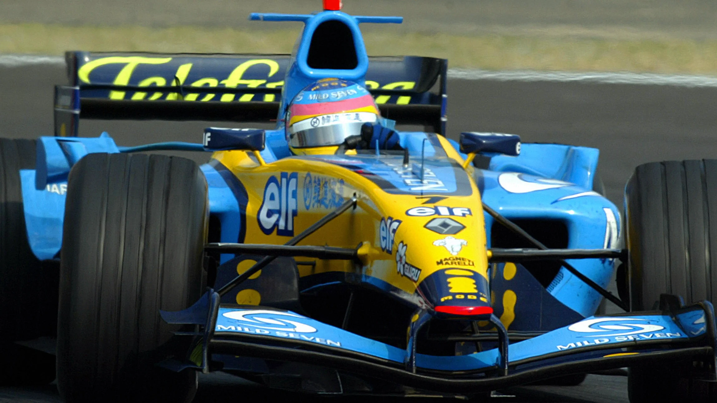 SHANGHAI, CHINA:  Renault's driver Jacques Villeneuve of Canada powers his car during the Chinese