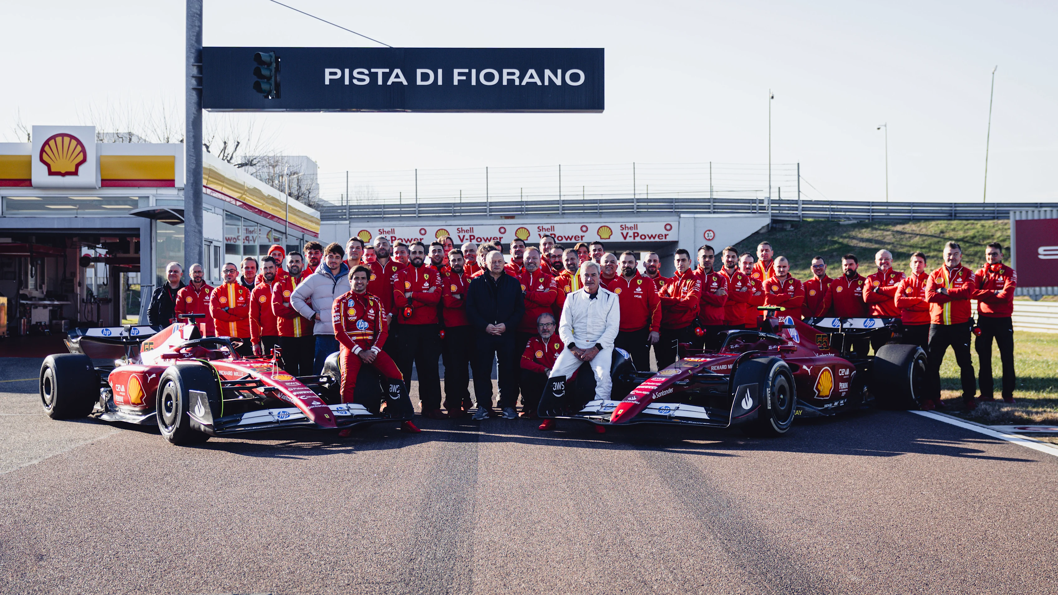 LUSAIL CITY, QATAR - NOVEMBER 29: Carlos Sainz of Spain and Ferrari walks in the Paddock prior to