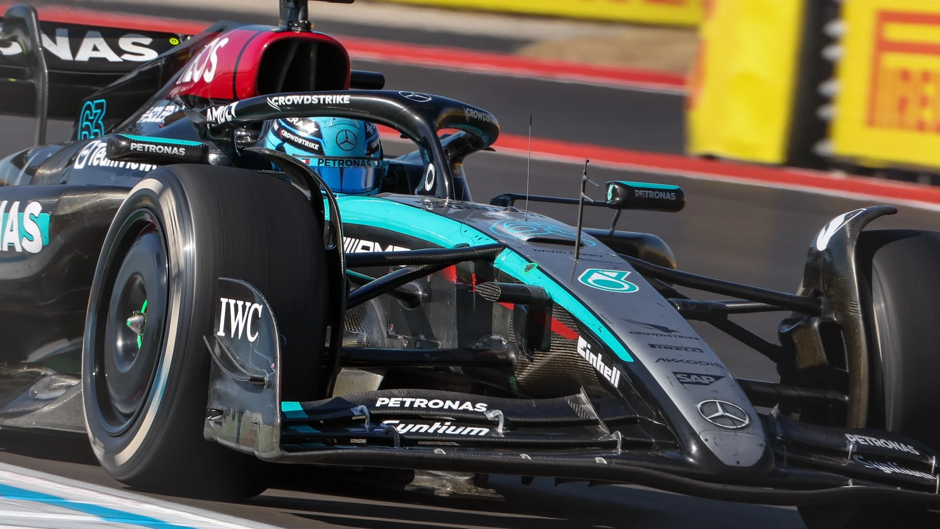 AUSTIN, TEXAS - OCTOBER 19: 5th placed George Russell of Great Britain and Mercedes talks to the