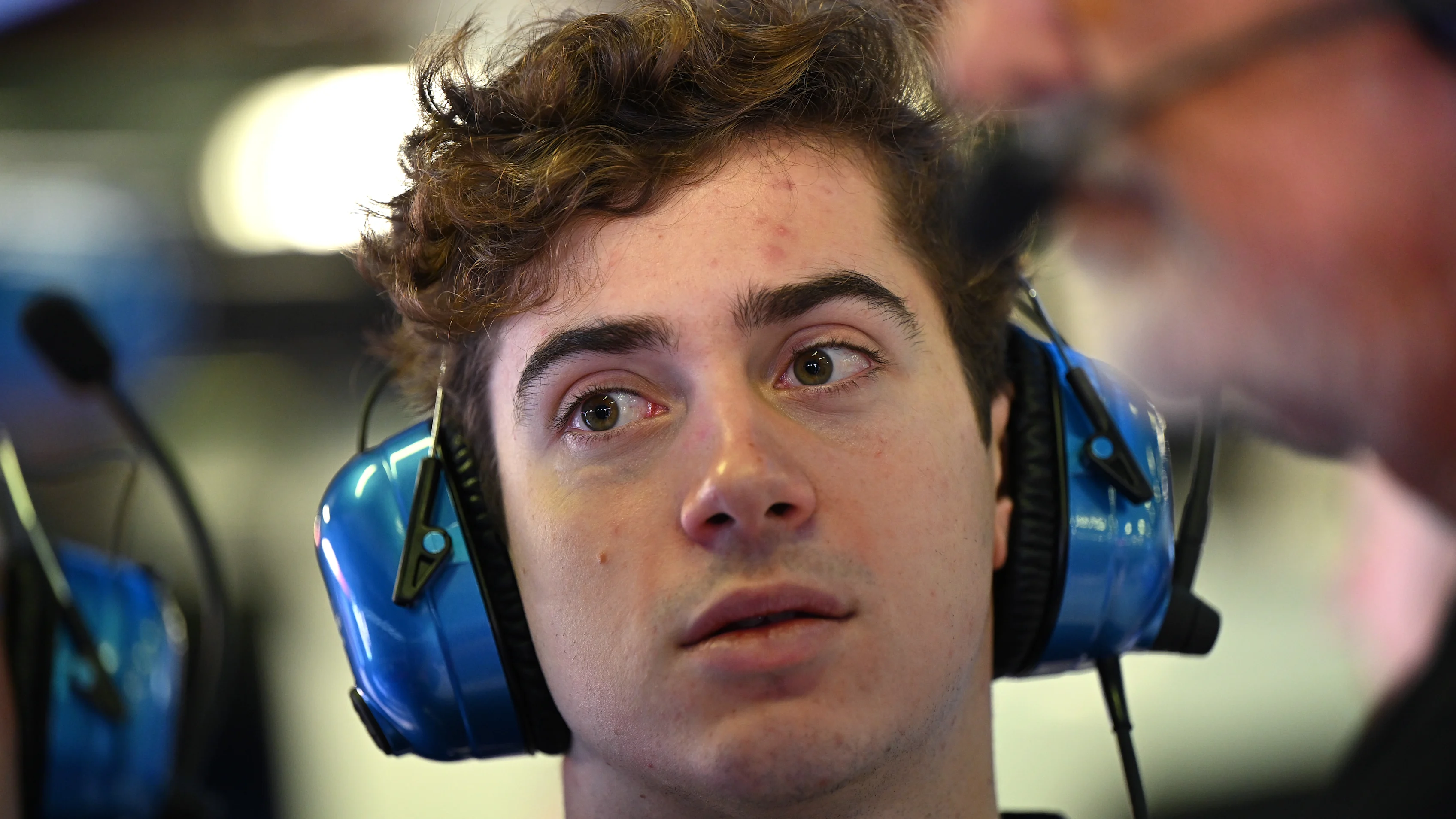 MELBOURNE, AUSTRALIA - MARCH 14: Franco Colapinto, Reserve Driver, Alpine F1 looks on in the garage