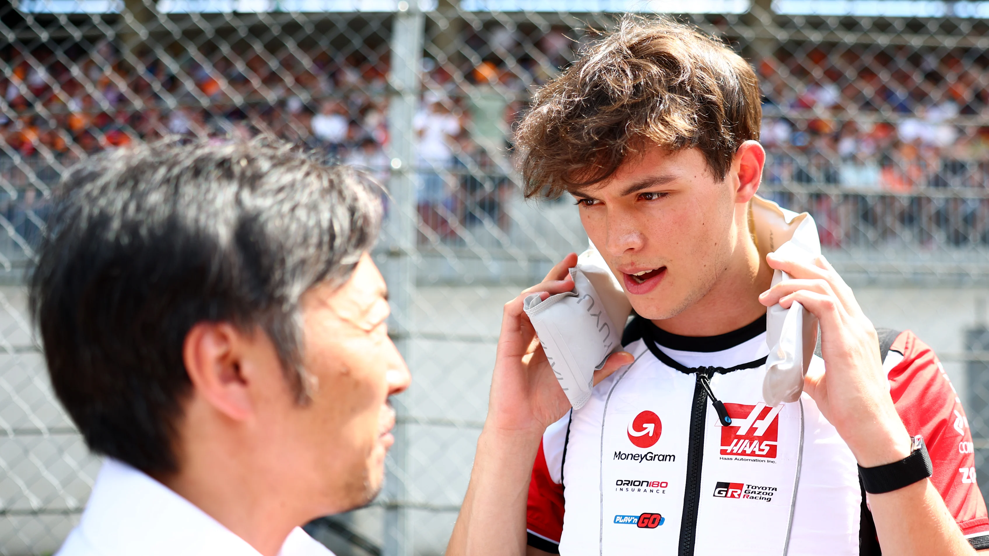 SPIELBERG, AUSTRIA - JUNE 29: Ayao Komatsu, Team Principal of Haas F1 and Oliver Bearman of Great