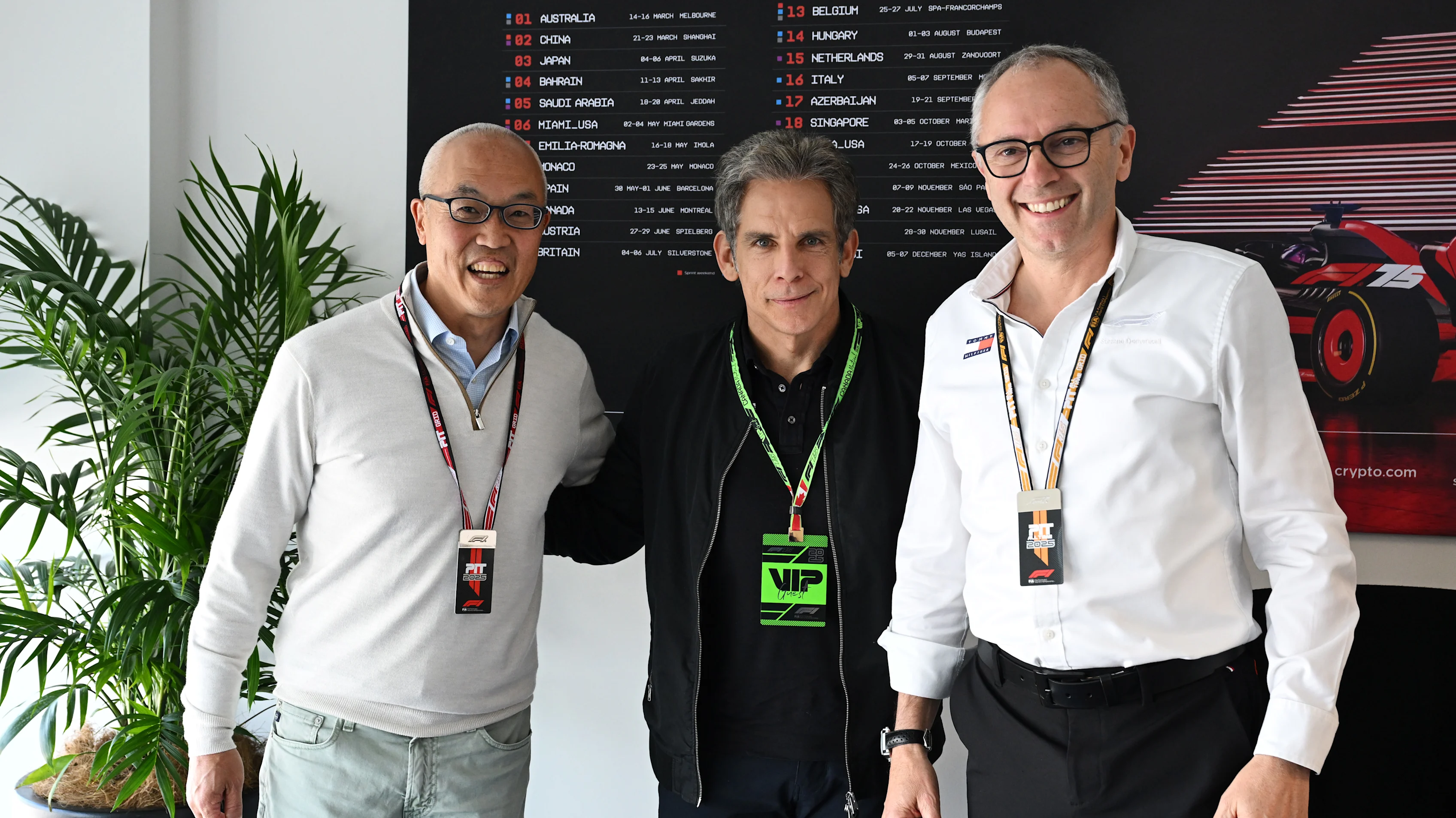 Derek Chang, President and CEO of Liberty Media Corporation and Stefano Domenicali, CEO of F1, pose with Ben Stiller in Canada