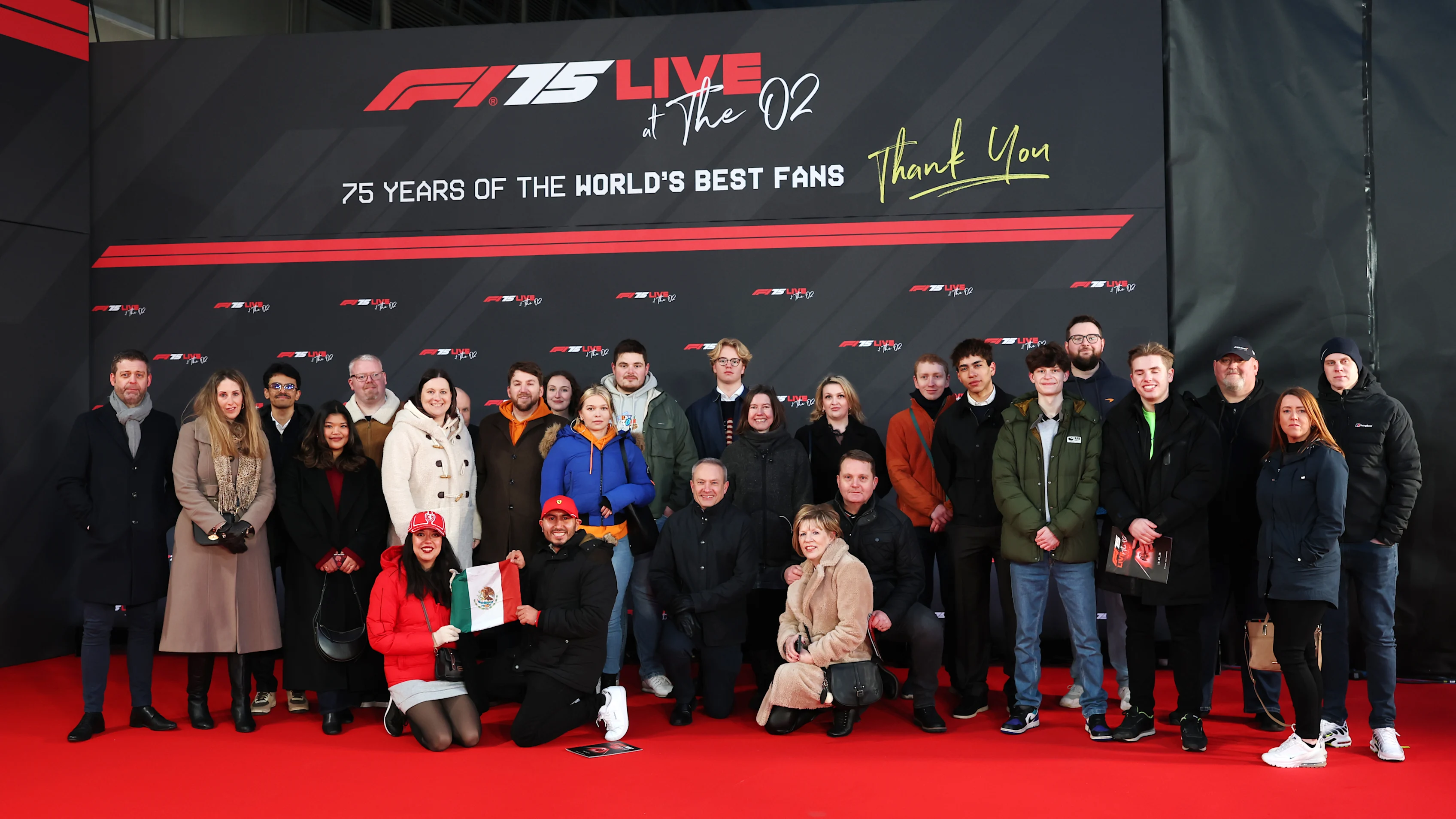 LONDON, ENGLAND - FEBRUARY 18: A group photo of F1 Unlocked prize winners at the F1 75 Live at The