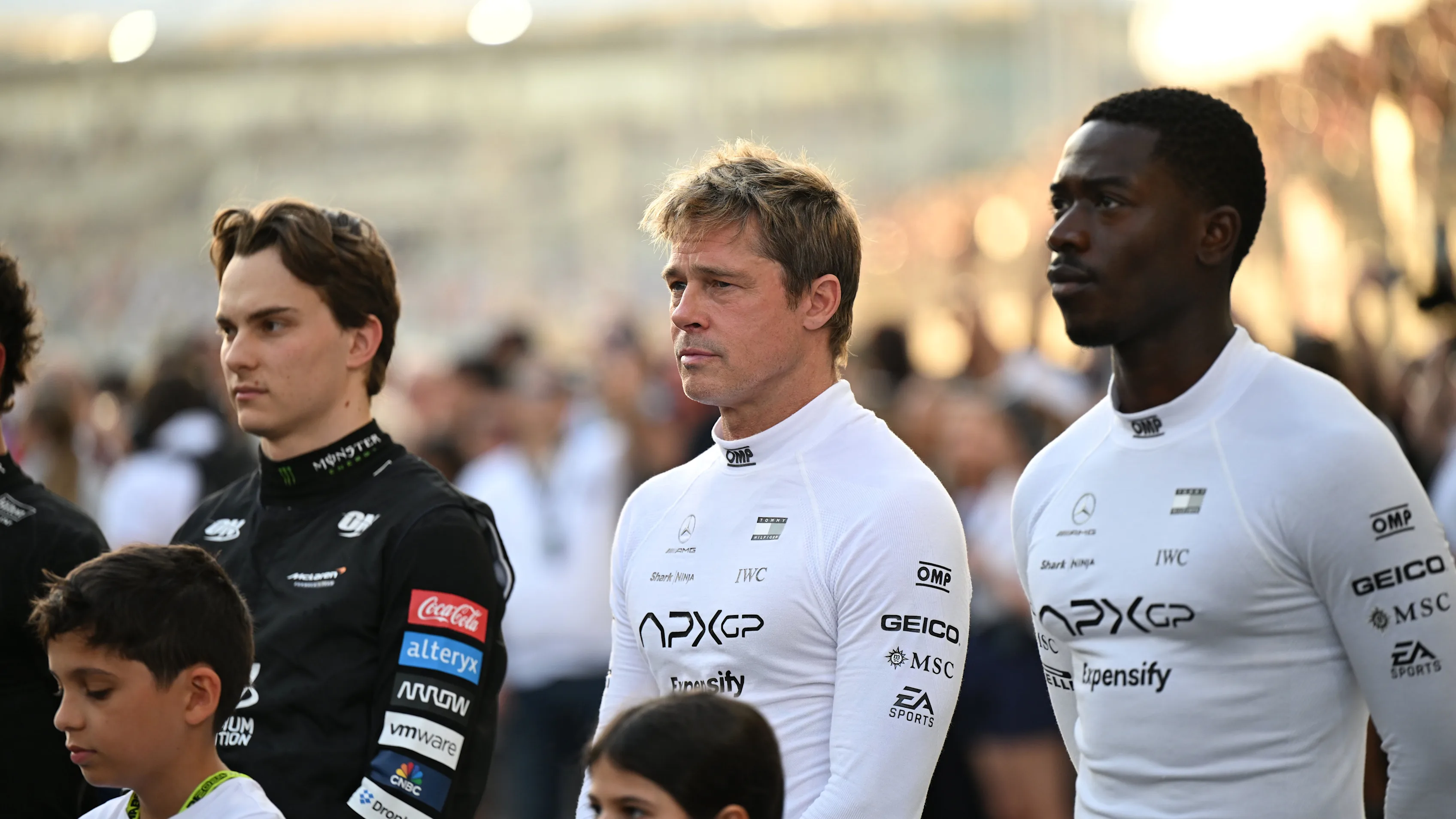 ABU DHABI, UNITED ARAB EMIRATES - DECEMBER 08: Brad Pitt and Damson Idris with Oscar Piastri,