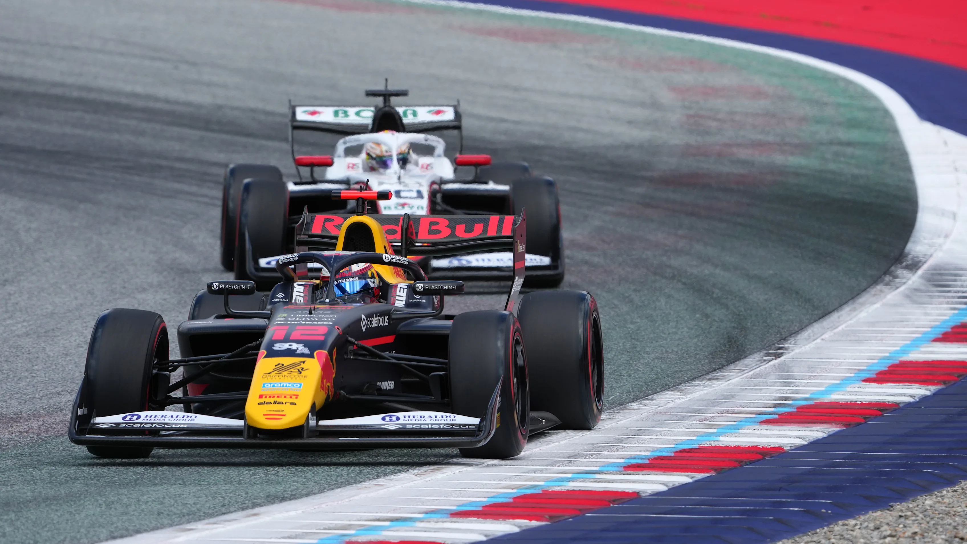 SPIELBERG, AUSTRIA - JUNE 27: Nikola Tsolov of Bulgaria and Campos Racing (12) leads Mari Boya of