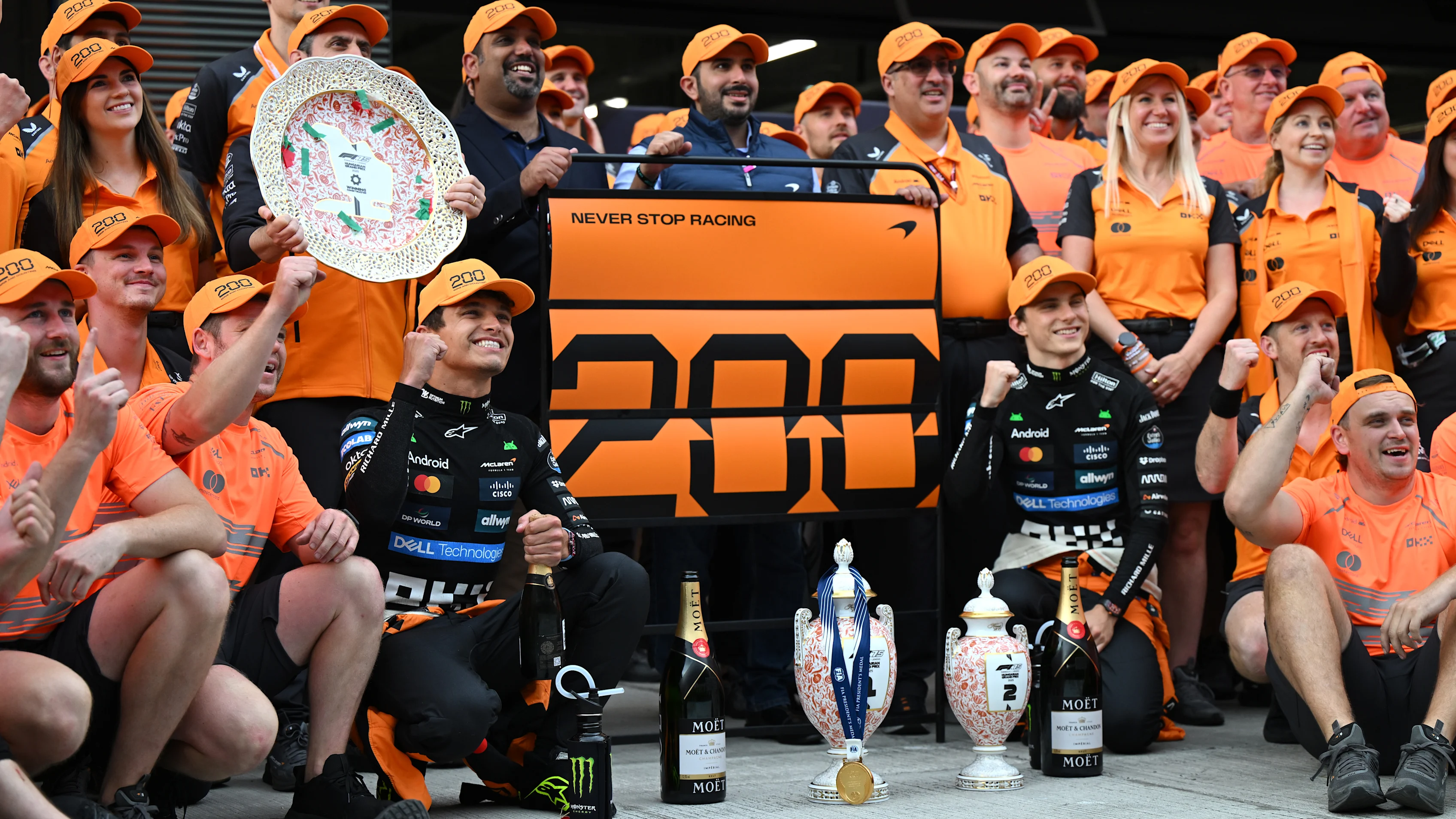 BUDAPEST, HUNGARY - AUGUST 03: Race winner Lando Norris of Great Britain and McLaren Second placed