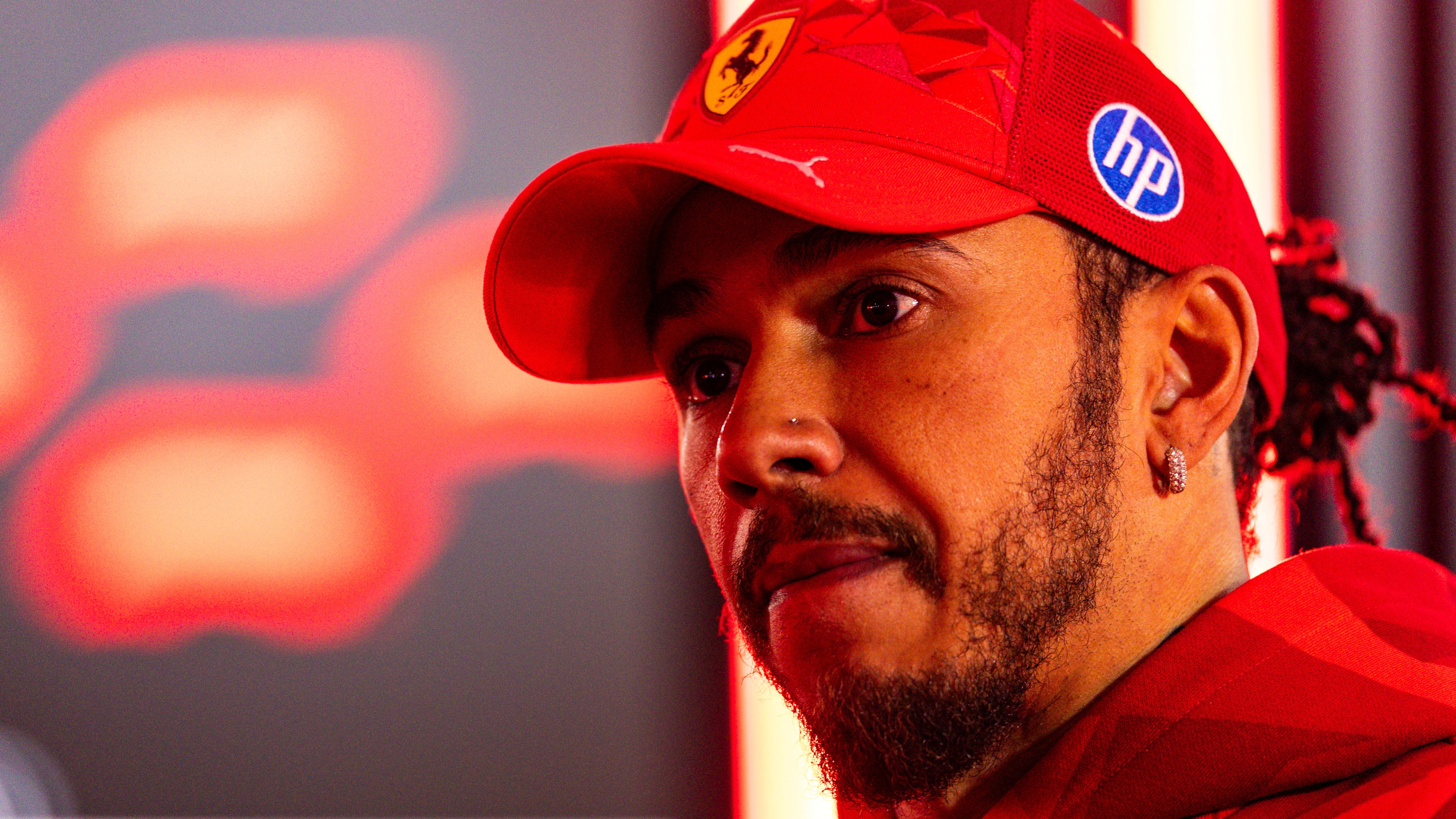 LAS VEGAS, NEVADA - NOVEMBER 22: Lewis Hamilton of Great Britain and Scuderia Ferrari answers