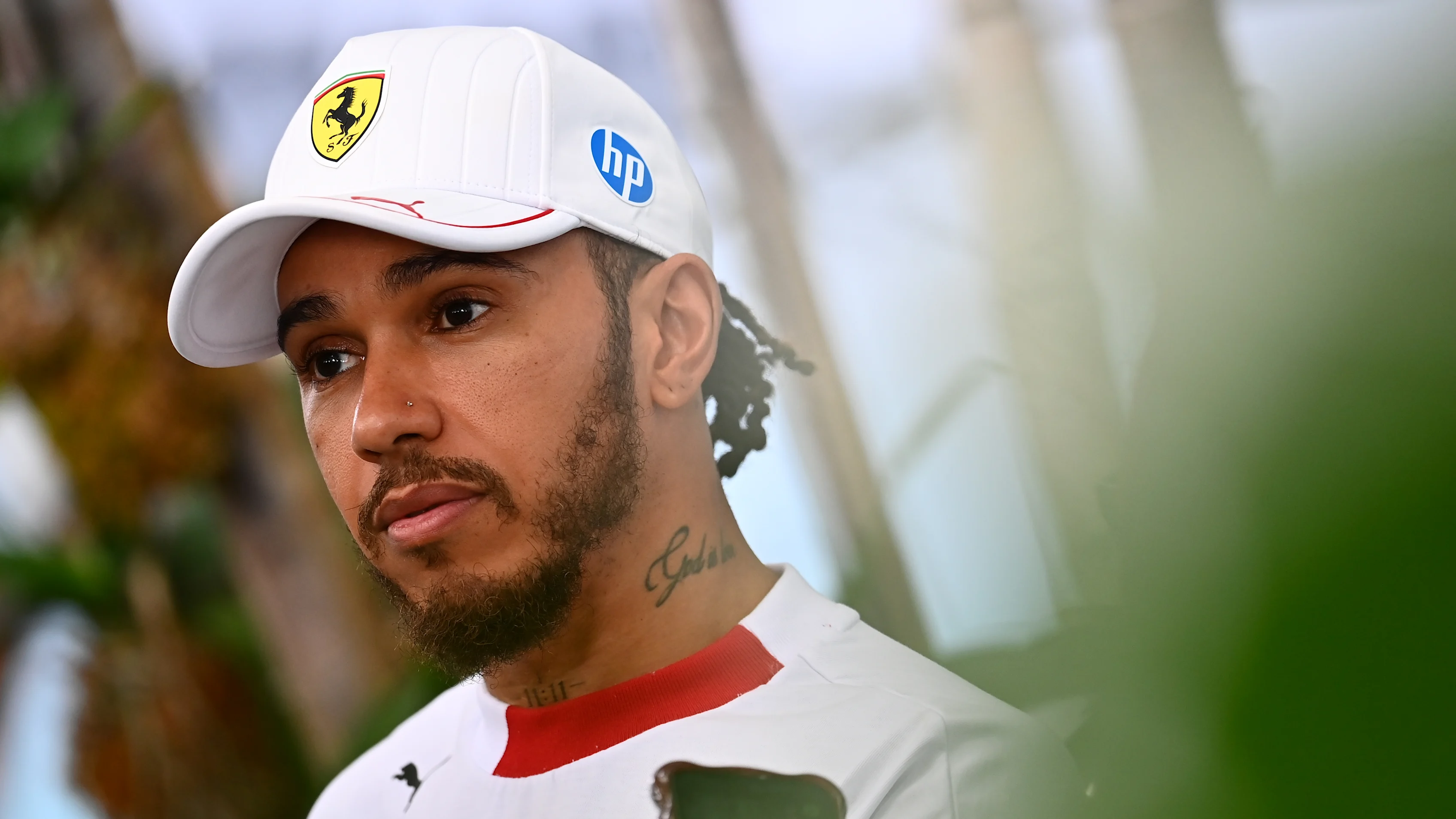 MIAMI, FLORIDA - MAY 03: Twelfth placed qualifier Lewis Hamilton of Great Britain and Scuderia