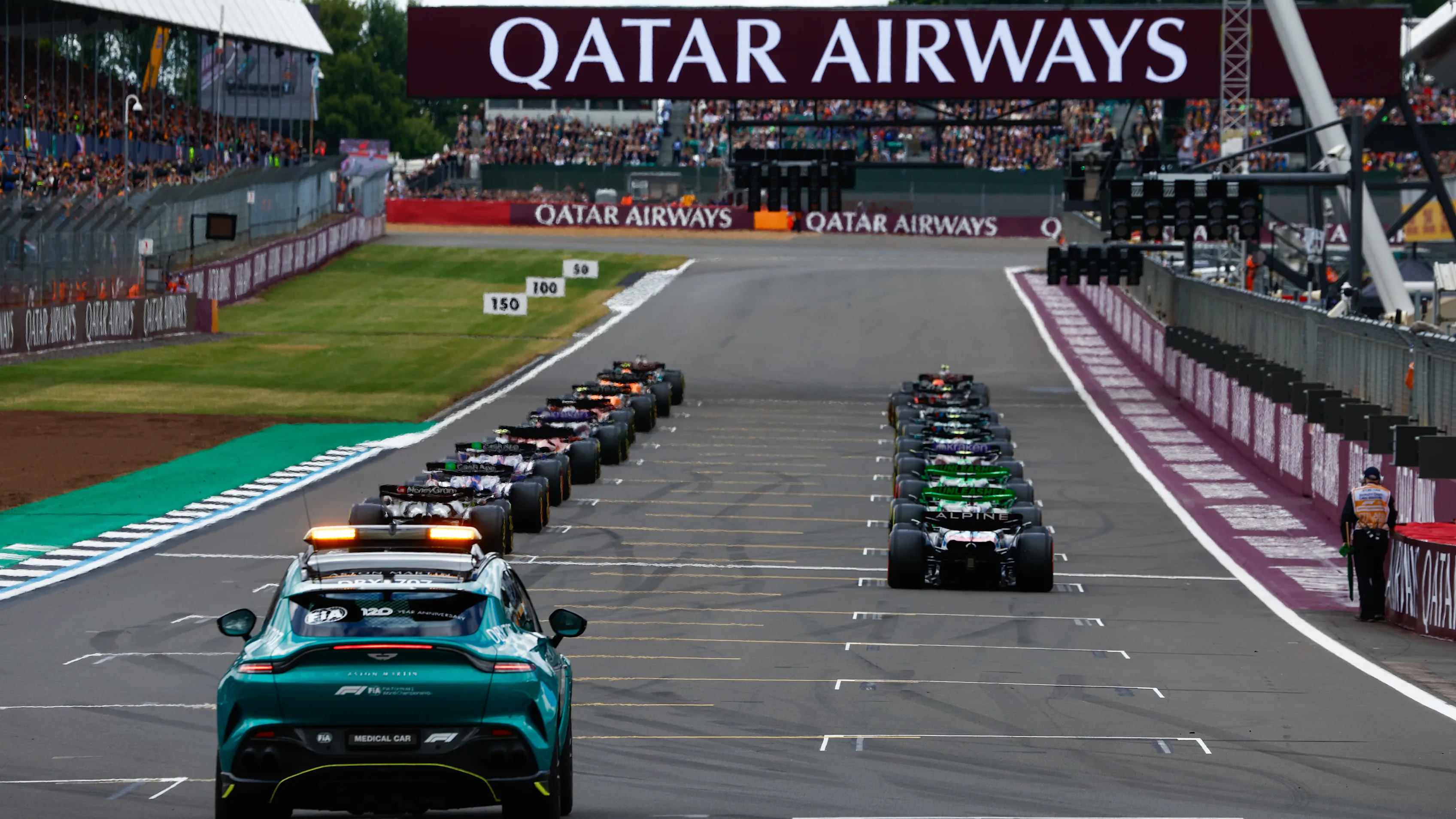 The safety car sits at the back of the grid prior to the start