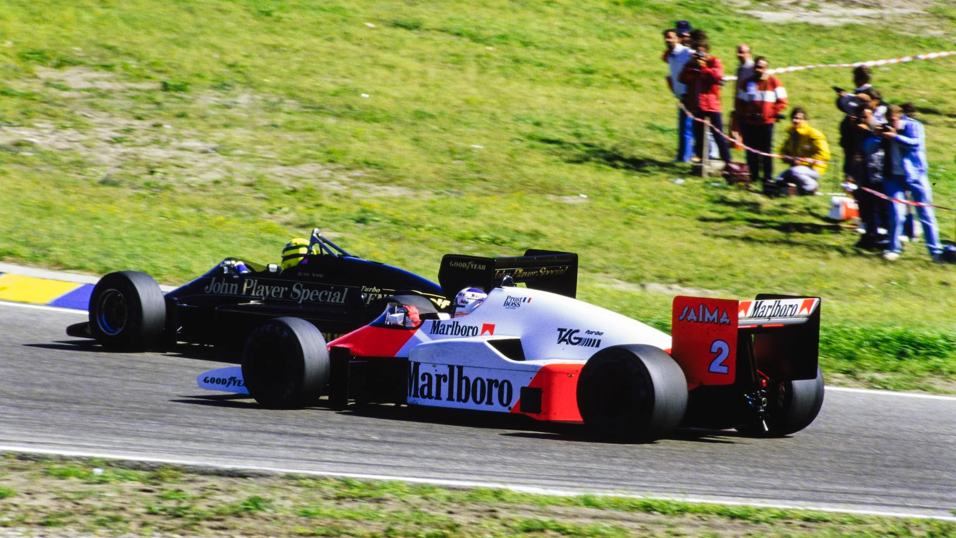 ZANDVOORT, NETHERLANDS - AUGUST 25: Ayrton Senna, Lotus 97T Renault, battles with Alain Prost,