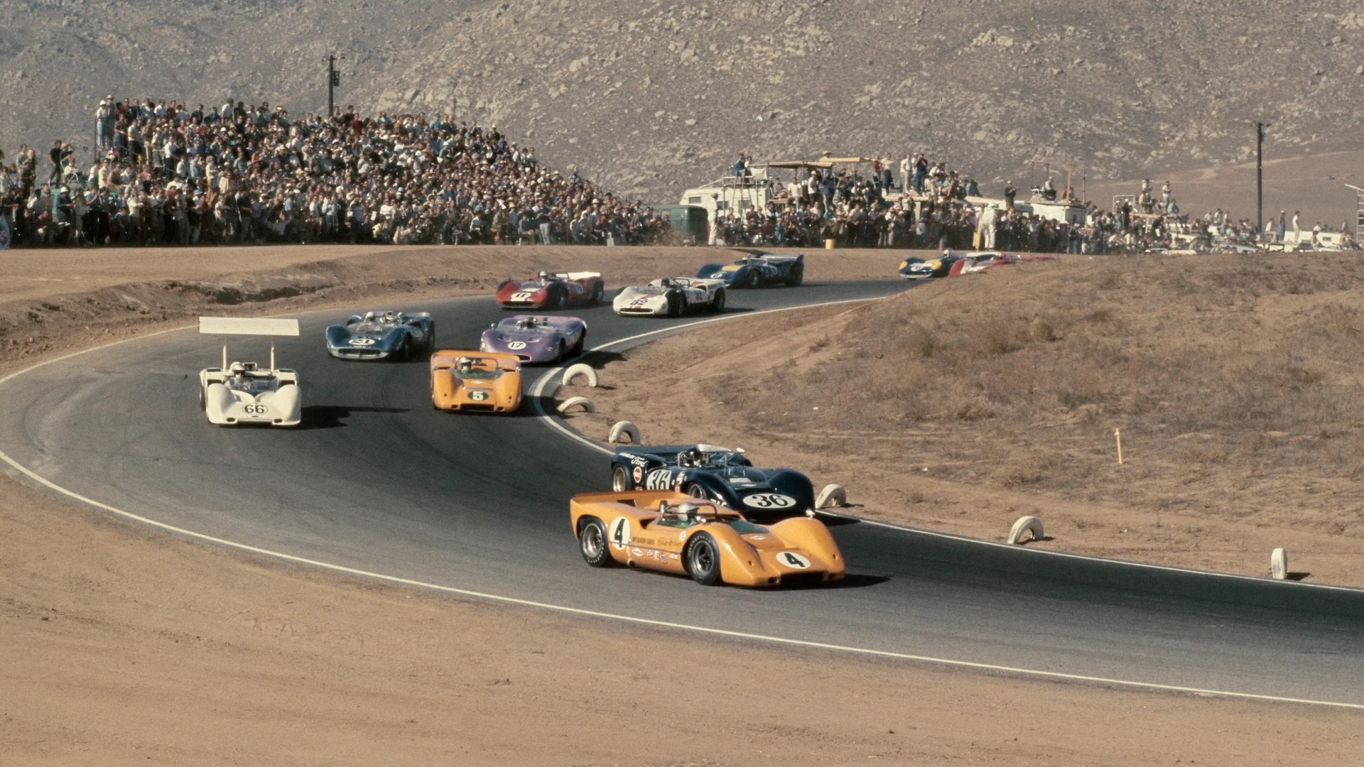 Bruce McLaren (1937 - 1970) from New Zealand drives the #4 McLaren Cars Ltd McLaren M6A Chevrolet