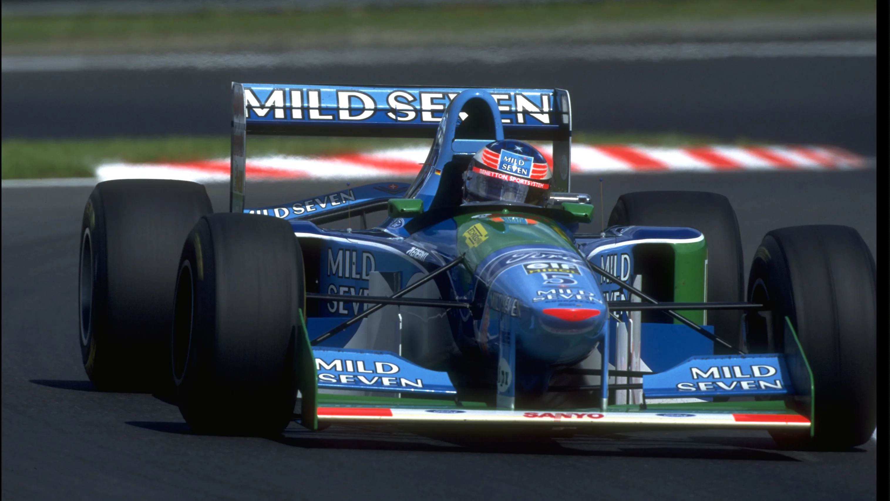 28 AUG 1994:  MICHAEL SCHUMACHER OF GERMANY COMES OUT OF A RIGHT HAND BEND IN HIS BENETTON FORD