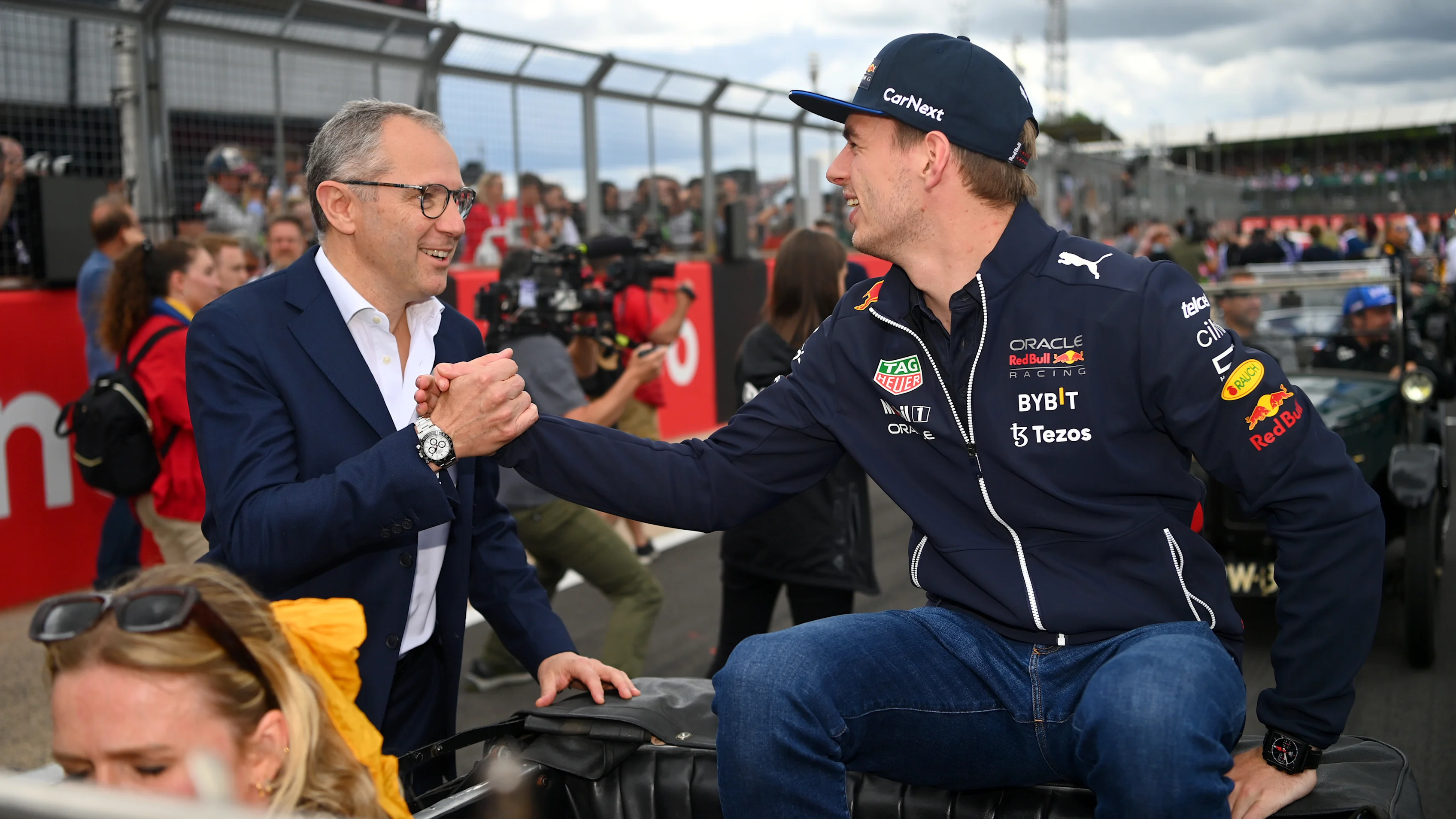NORTHAMPTON, ENGLAND - JULY 03: Max Verstappen of the Netherlands and Oracle Red Bull Racing talks