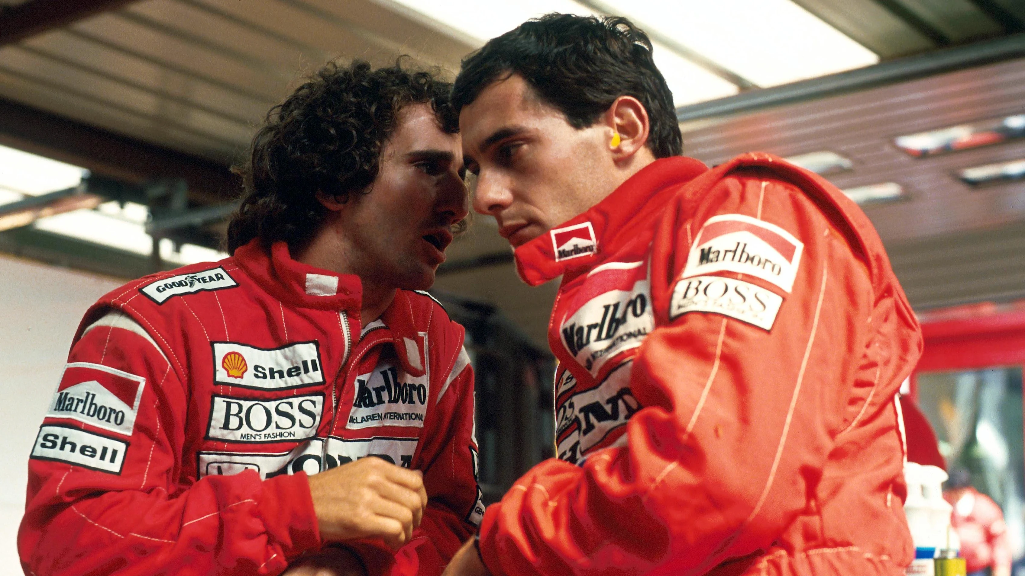 SPA, BELGIUM - AUGUST 28:   (L to R): Second placed Alain Prost of France with his McLaren team